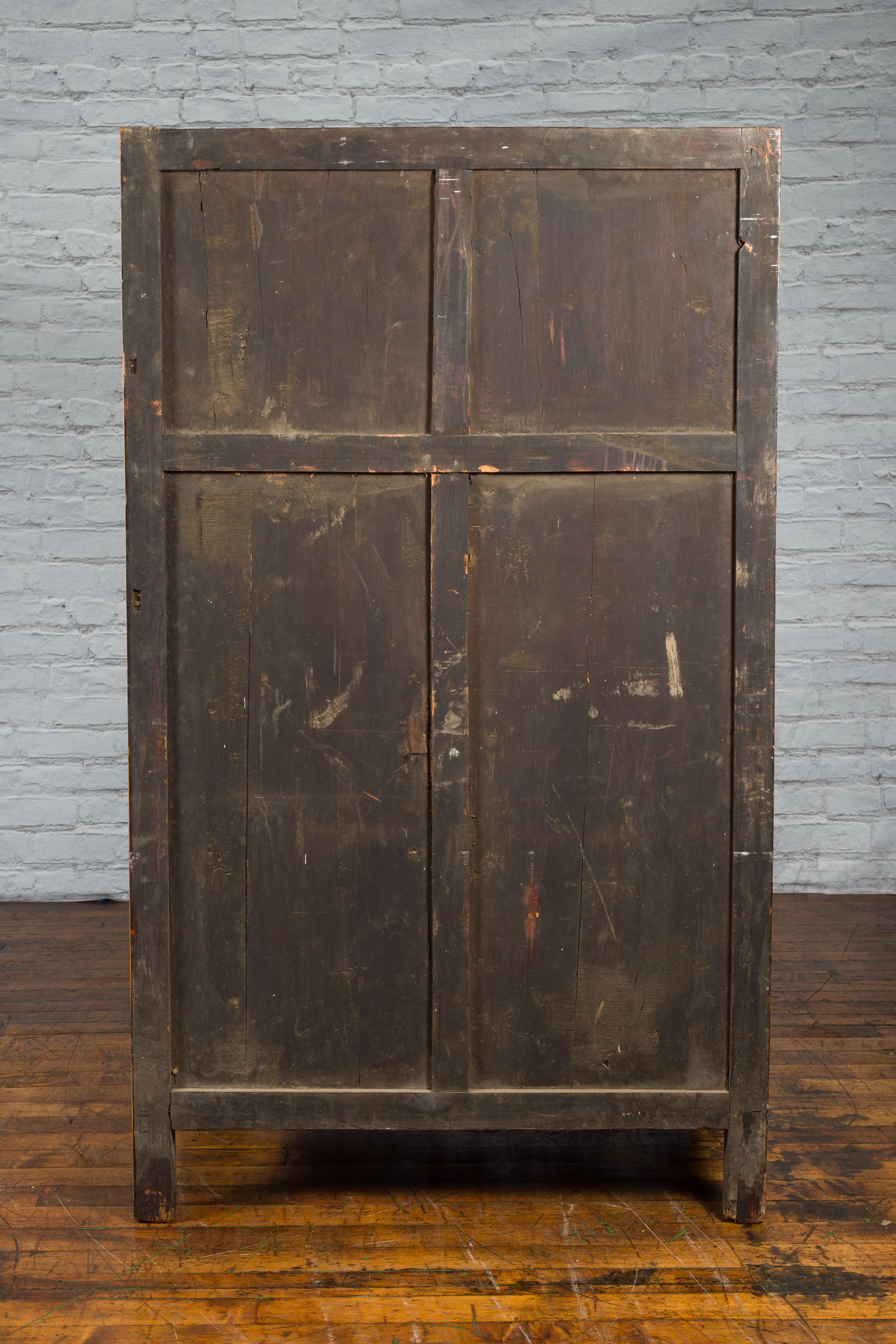 Chinese Qing Dynasty 19th Century Elmwood Cabinet with Carved Apron For Sale 9