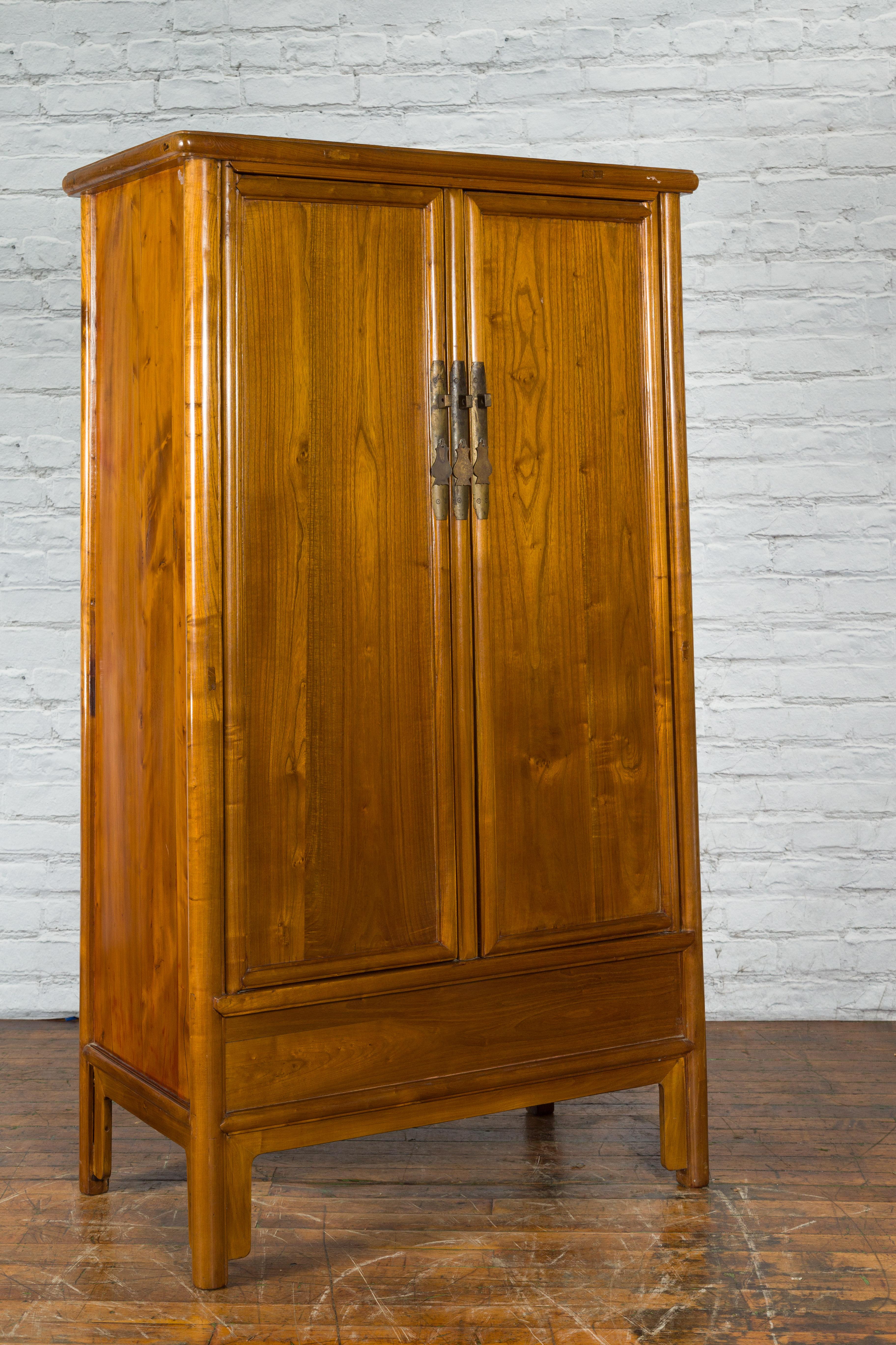 Carved Chinese Qing Dynasty 19th Century Elmwood Noodle Cabinet with Hidden Drawers For Sale