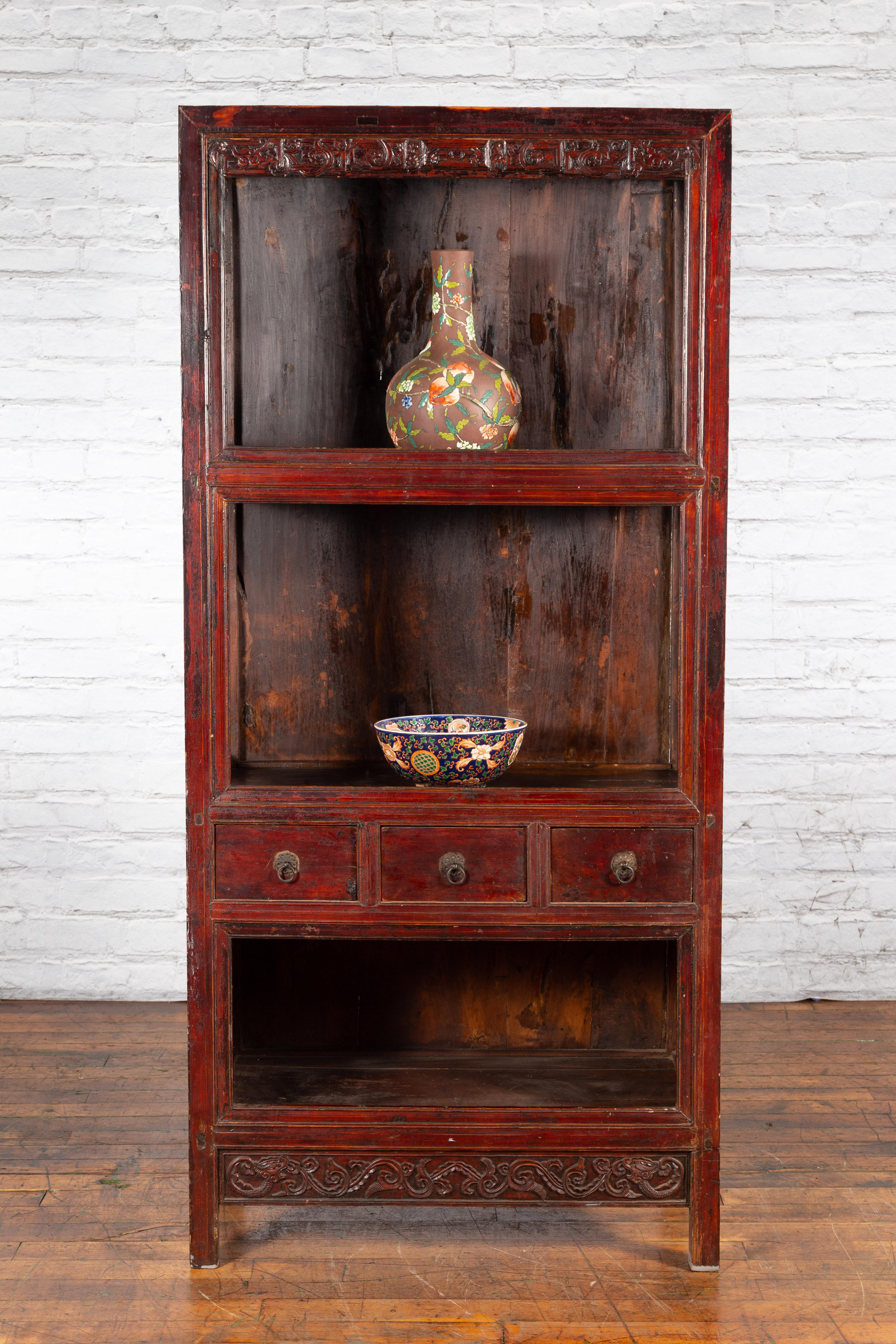 Chinese Qing Dynasty 19th Century Lacquered Cabinet with Carved Dragon Motifs In Good Condition For Sale In Yonkers, NY