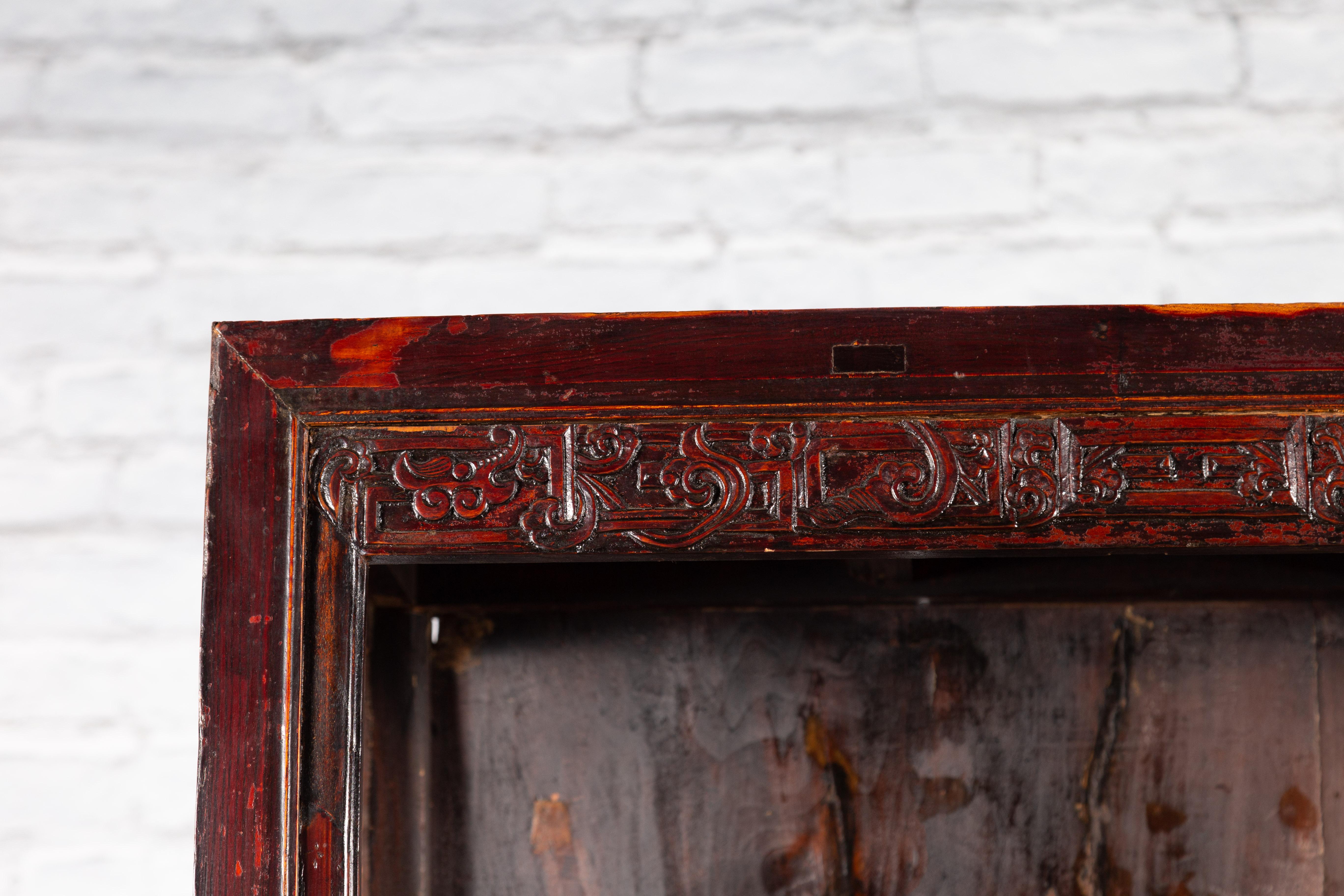 Chinese Qing Dynasty 19th Century Lacquered Cabinet with Carved Dragon Motifs For Sale 4