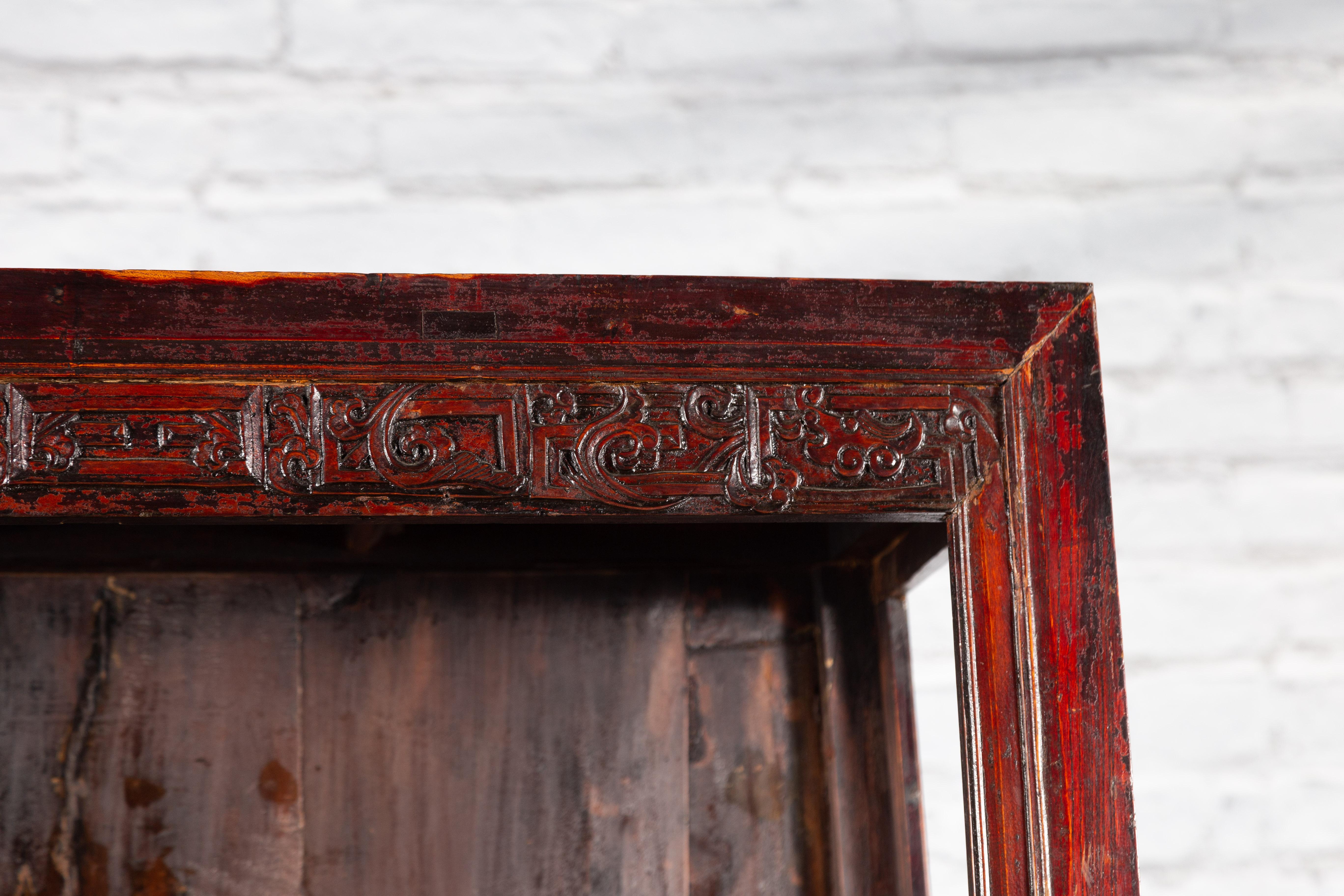 Chinese Qing Dynasty 19th Century Lacquered Cabinet with Carved Dragon Motifs For Sale 5