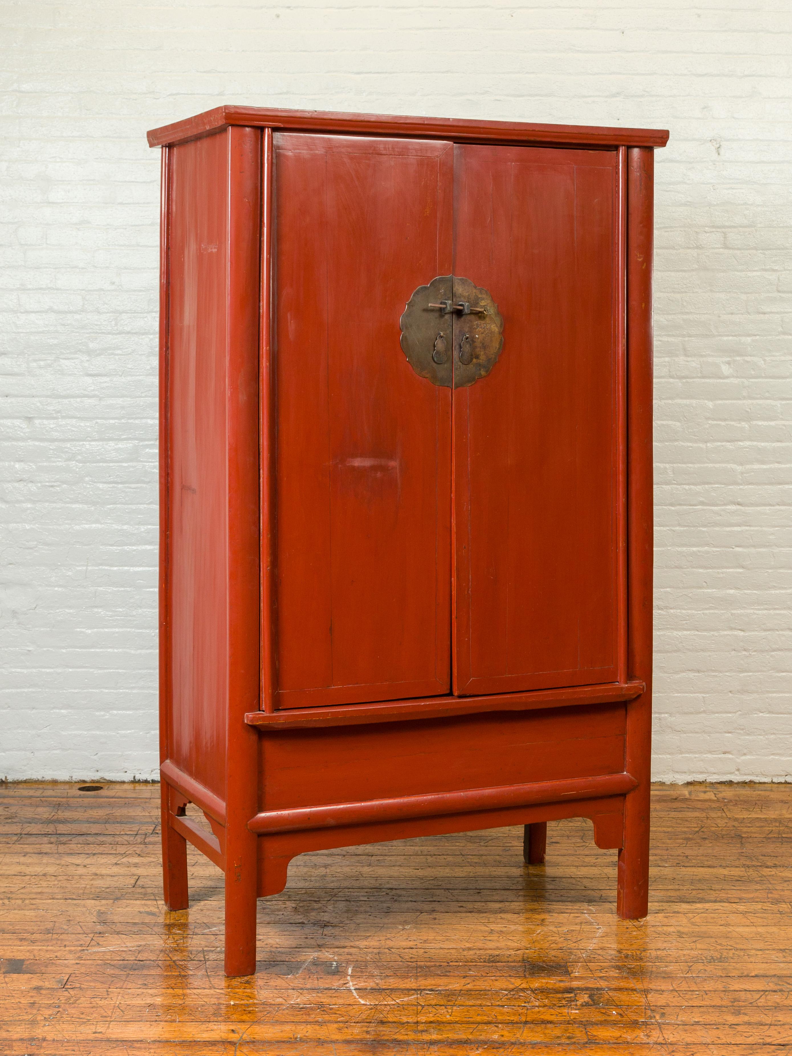 Chinese Qing Dynasty 19th Century Red Lacquered Armoire with Bronze Medallion In Good Condition In Yonkers, NY