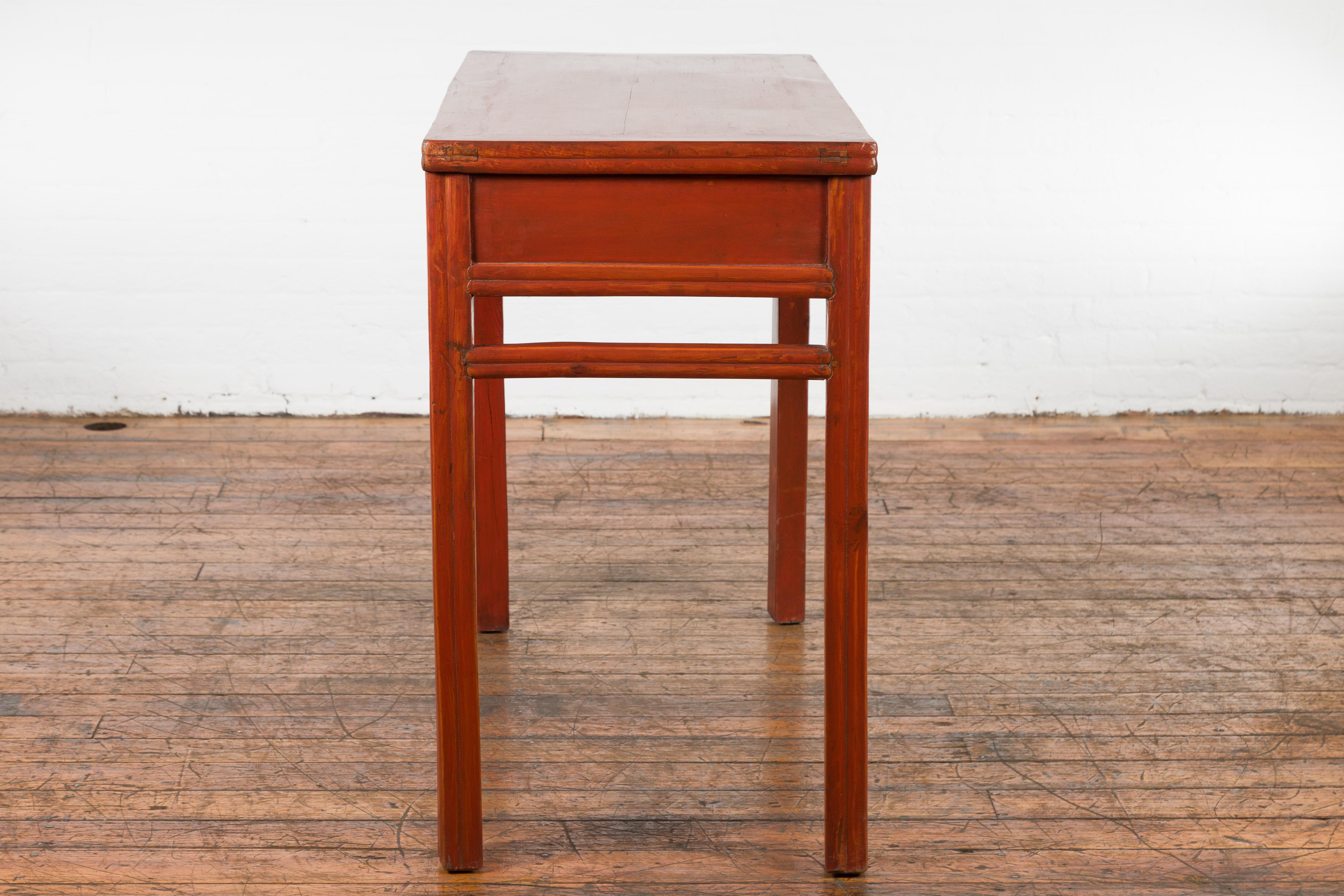 Chinese Qing Dynasty 19th Century Red Orange Lacquered Table with Three Drawers For Sale 16