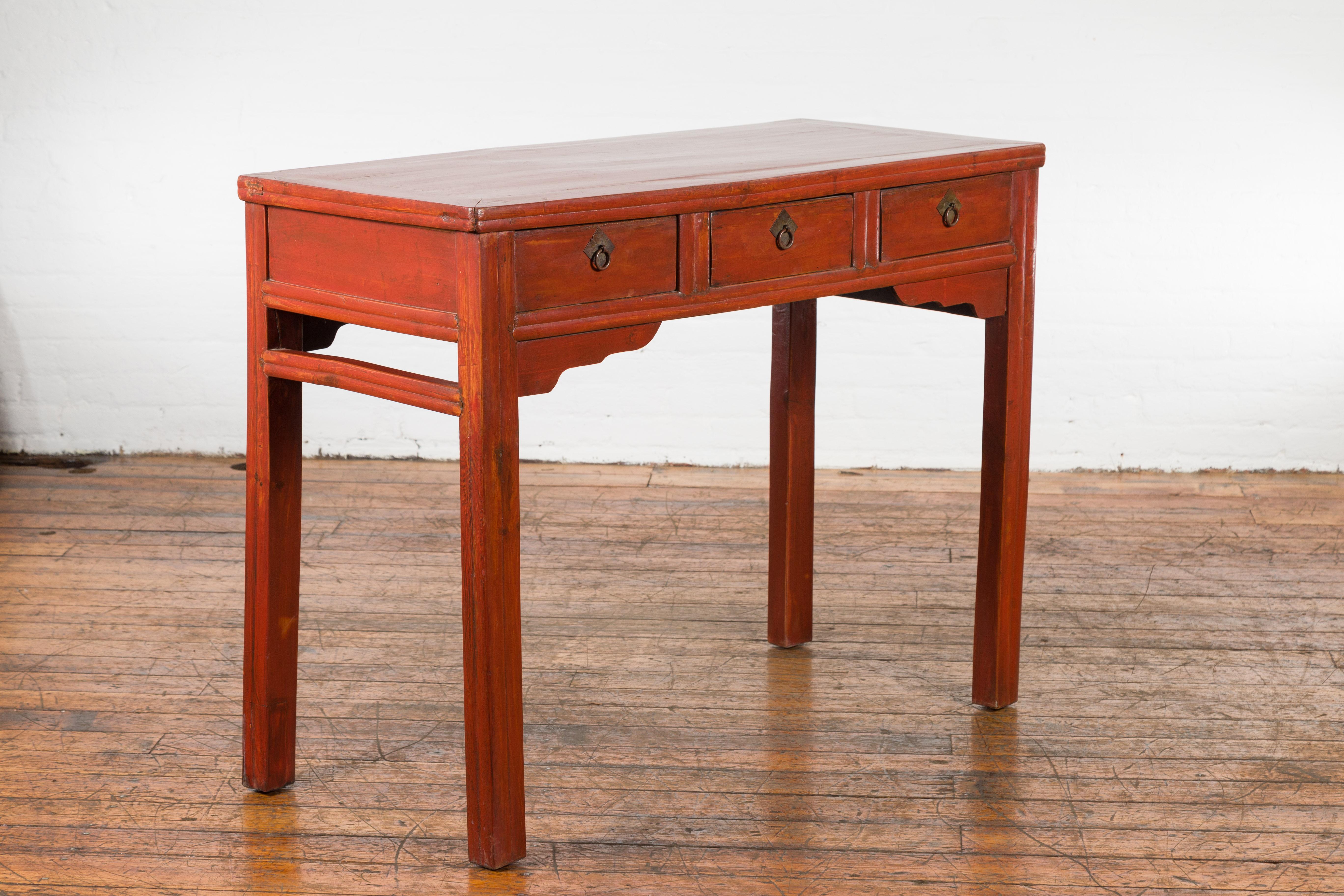 Brass Chinese Qing Dynasty 19th Century Red Orange Lacquered Table with Three Drawers For Sale