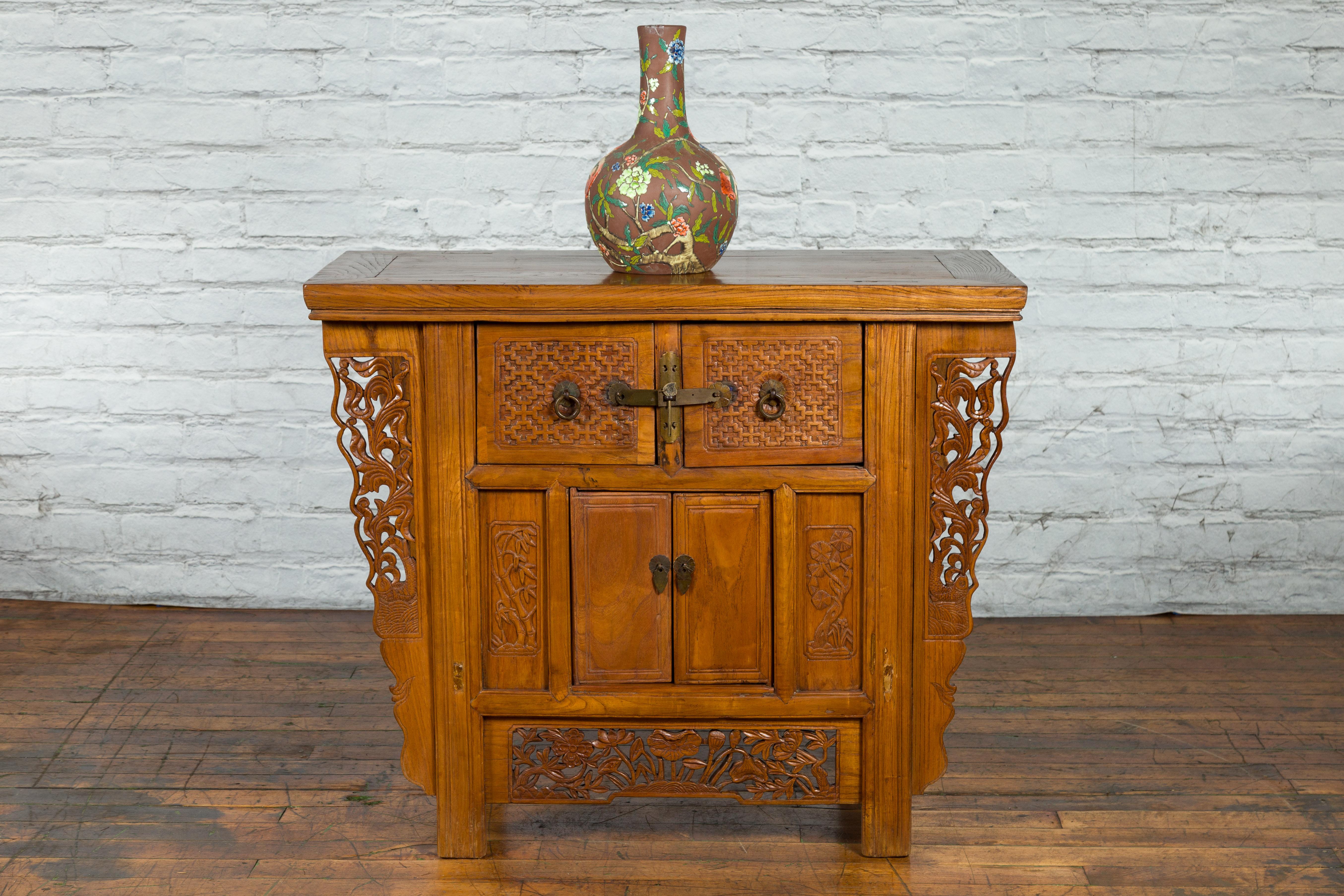 Chinese Qing Dynasty 19th Century Side Cabinet with Carved Foliage Motifs 1