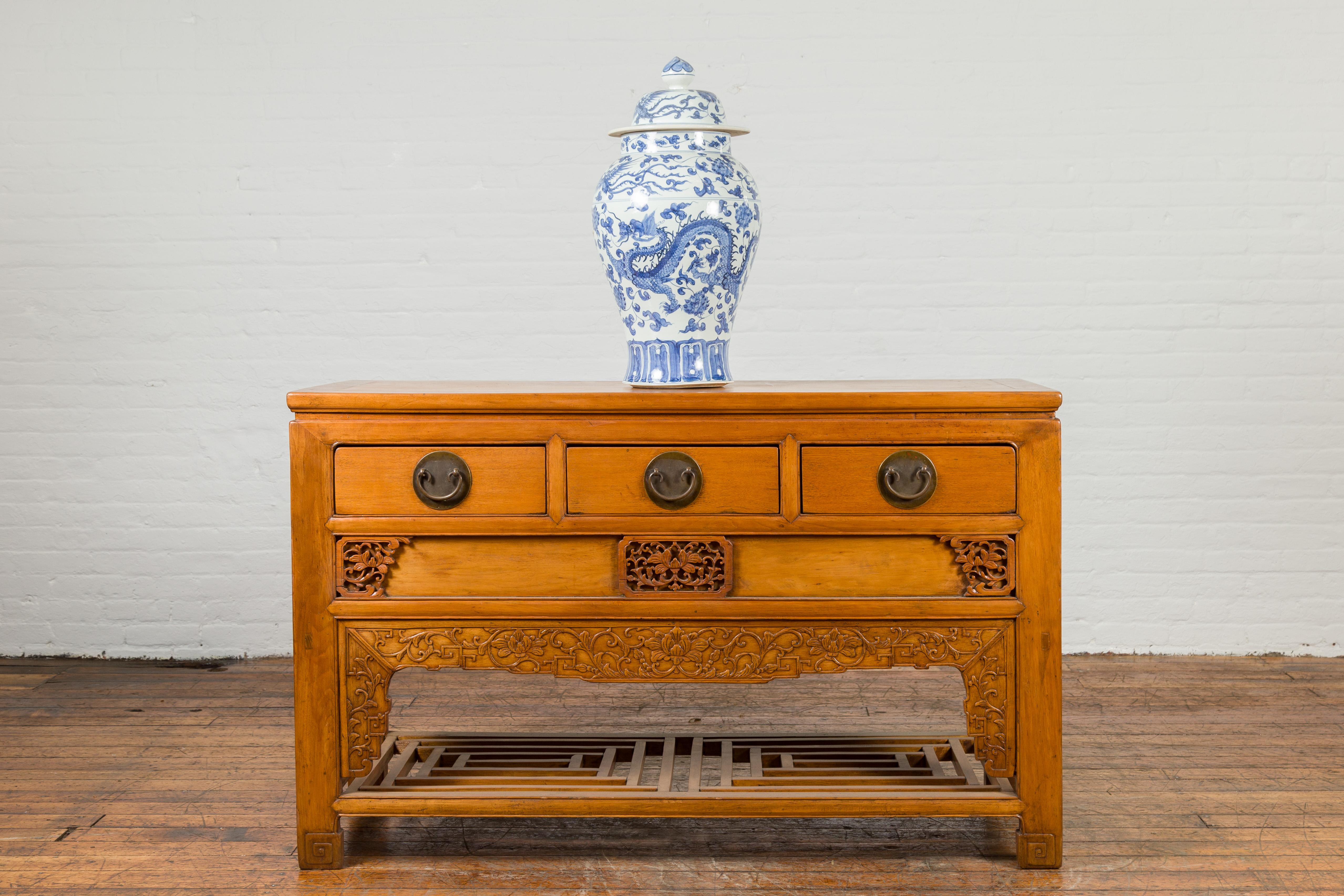 Chinese Qing Dynasty 19th Century Waisted Sideboard with Carved Floral Motifs In Good Condition For Sale In Yonkers, NY