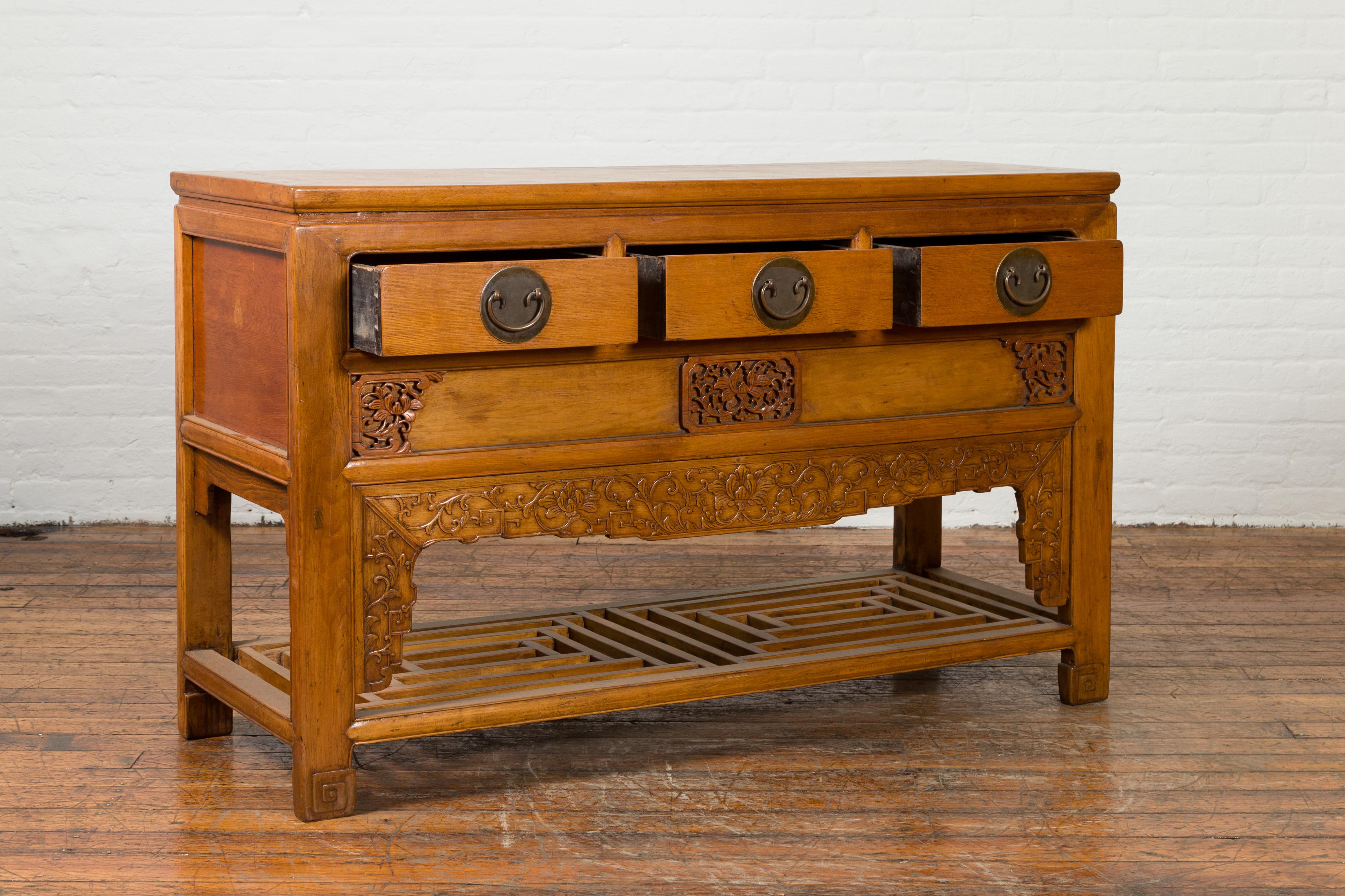Chinese Qing Dynasty 19th Century Waisted Sideboard with Carved Floral Motifs For Sale 1