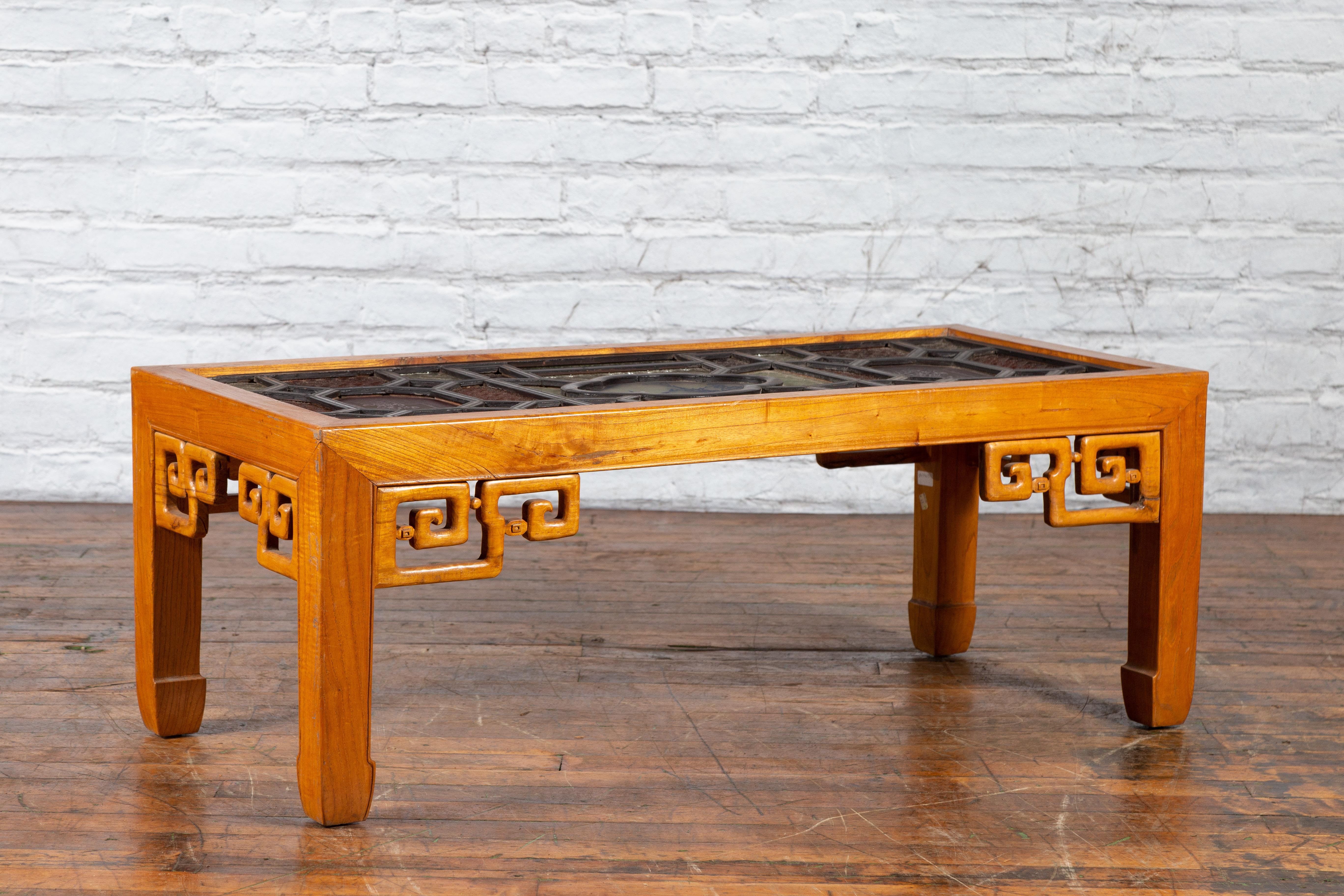 Fretwork Chinese Qing Dynasty 19th Century Wooden Coffee Table with Stained Glass Top For Sale