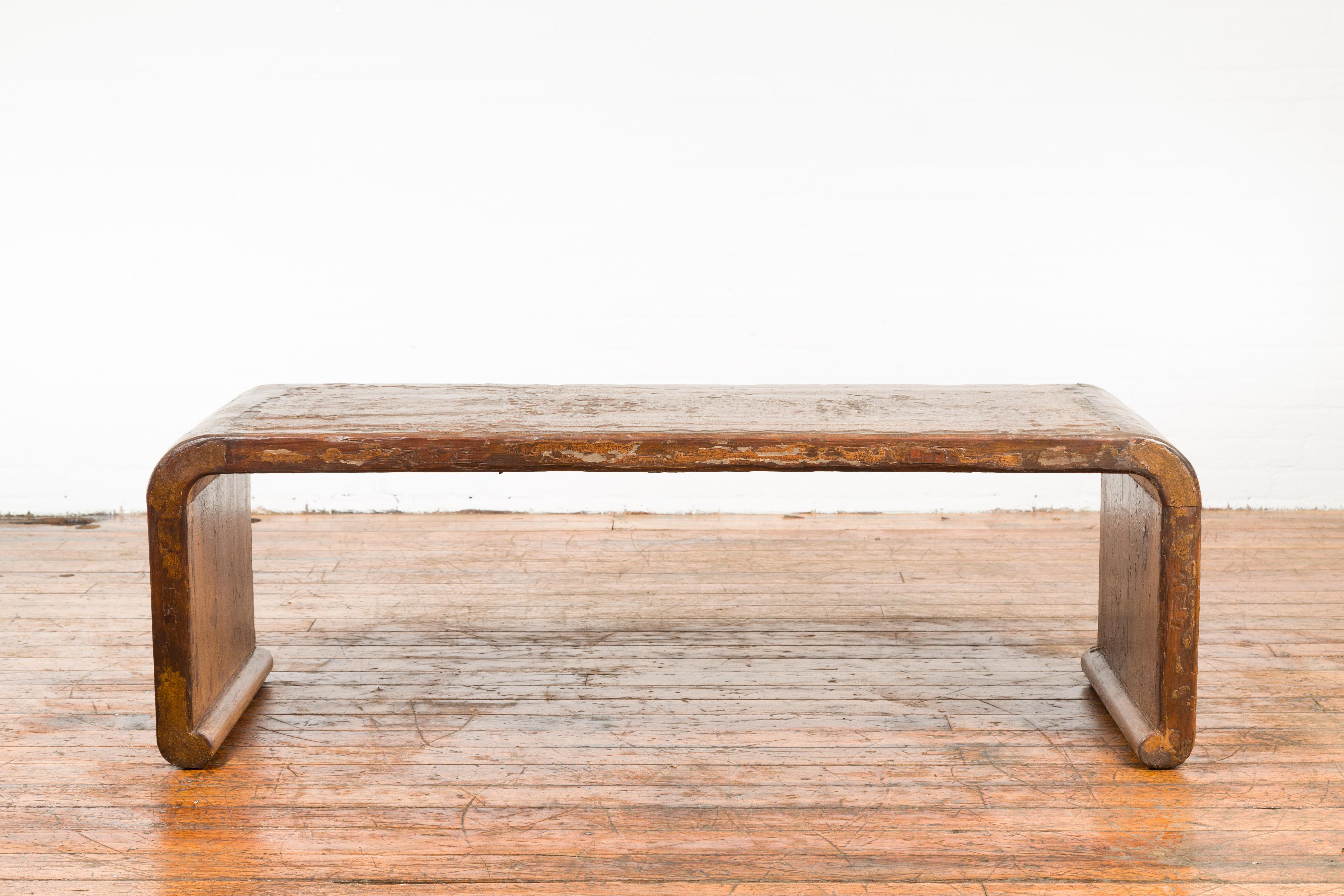 19th Century Chinese Qing Dynasty Distressed Waterfall Coffee Table with Scrolling Feet