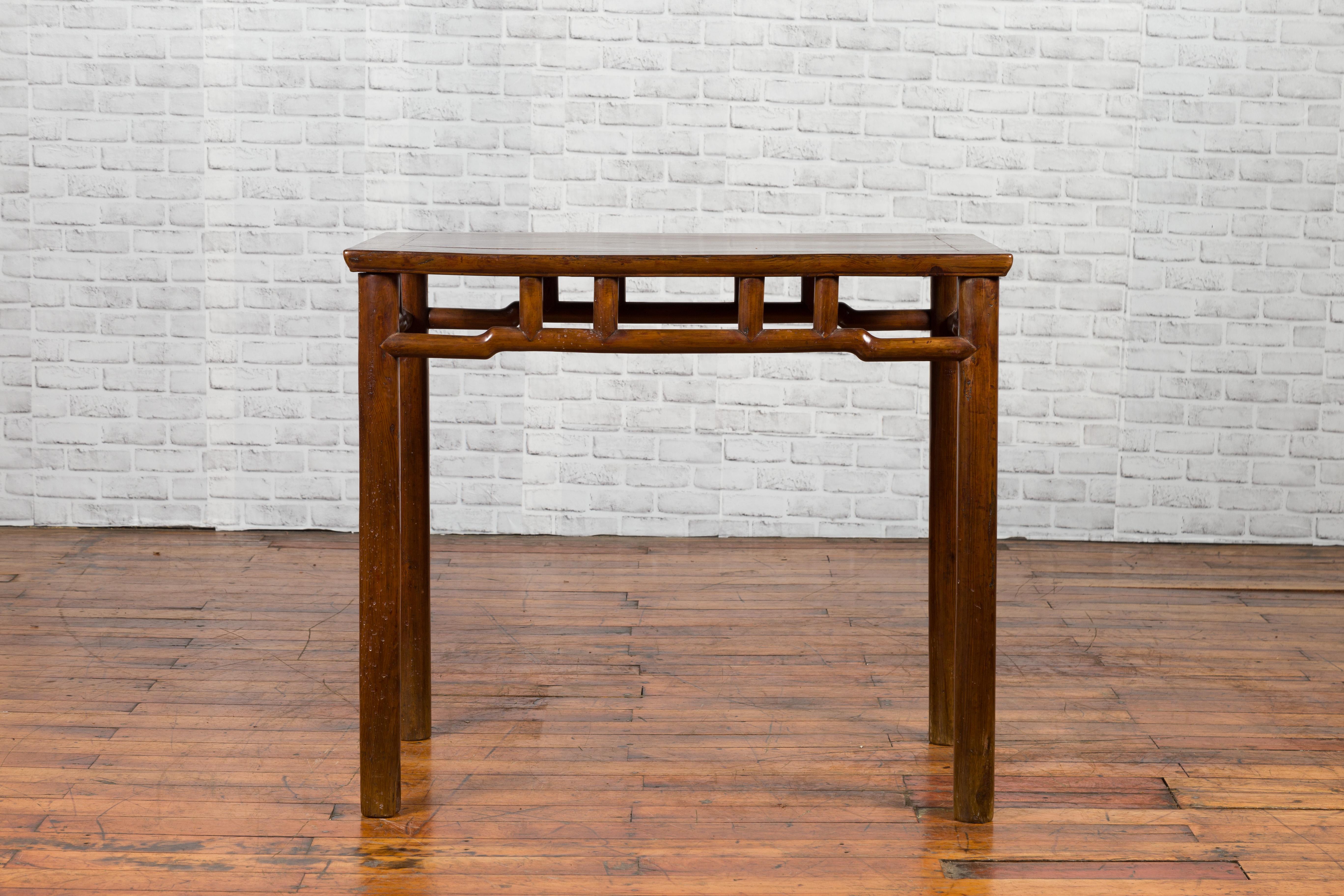 Chinese Qing Dynasty Elm Console Table with Pillar Struts and Humpbacked Apron 9