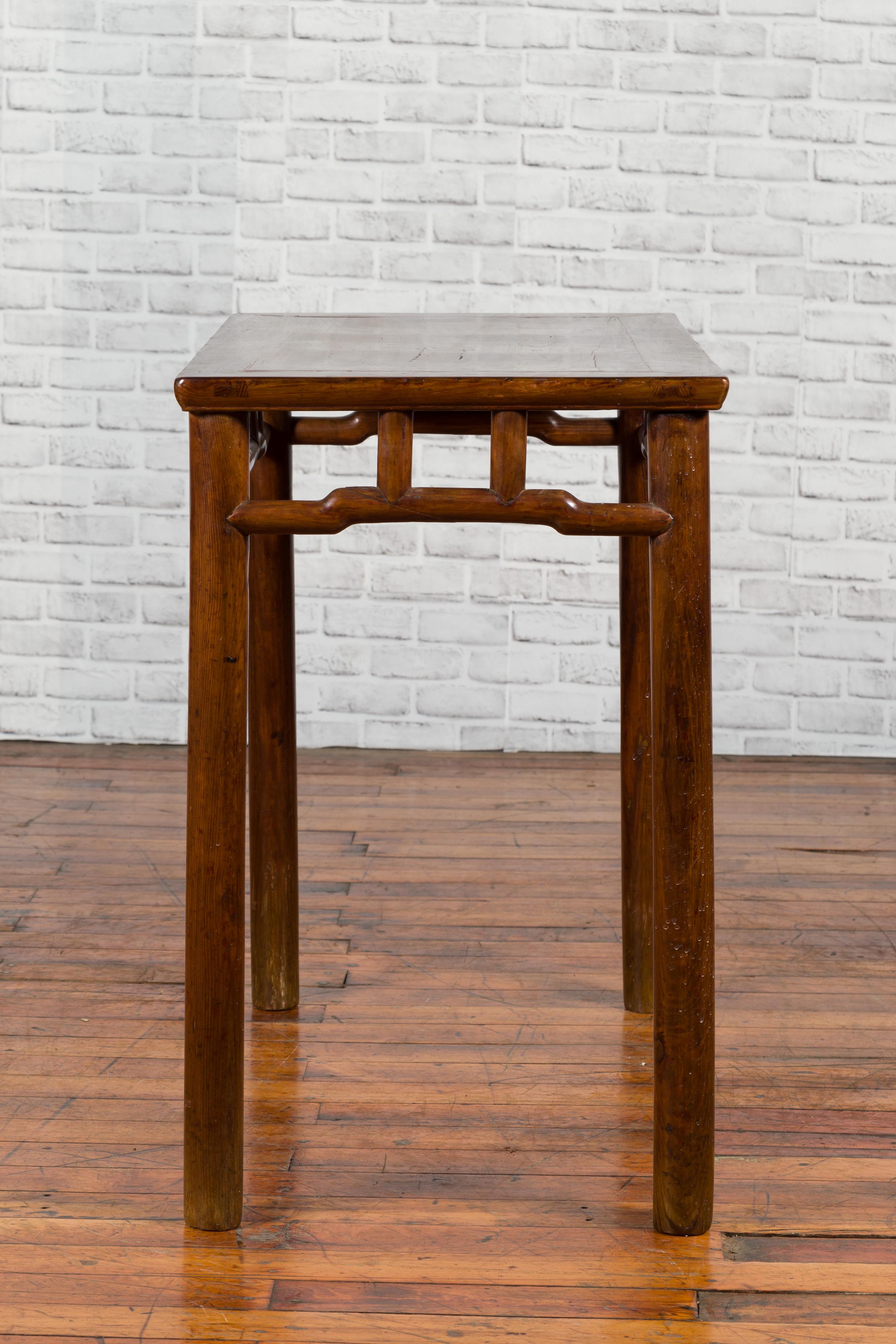 Chinese Qing Dynasty Elm Console Table with Pillar Struts and Humpbacked Apron 10