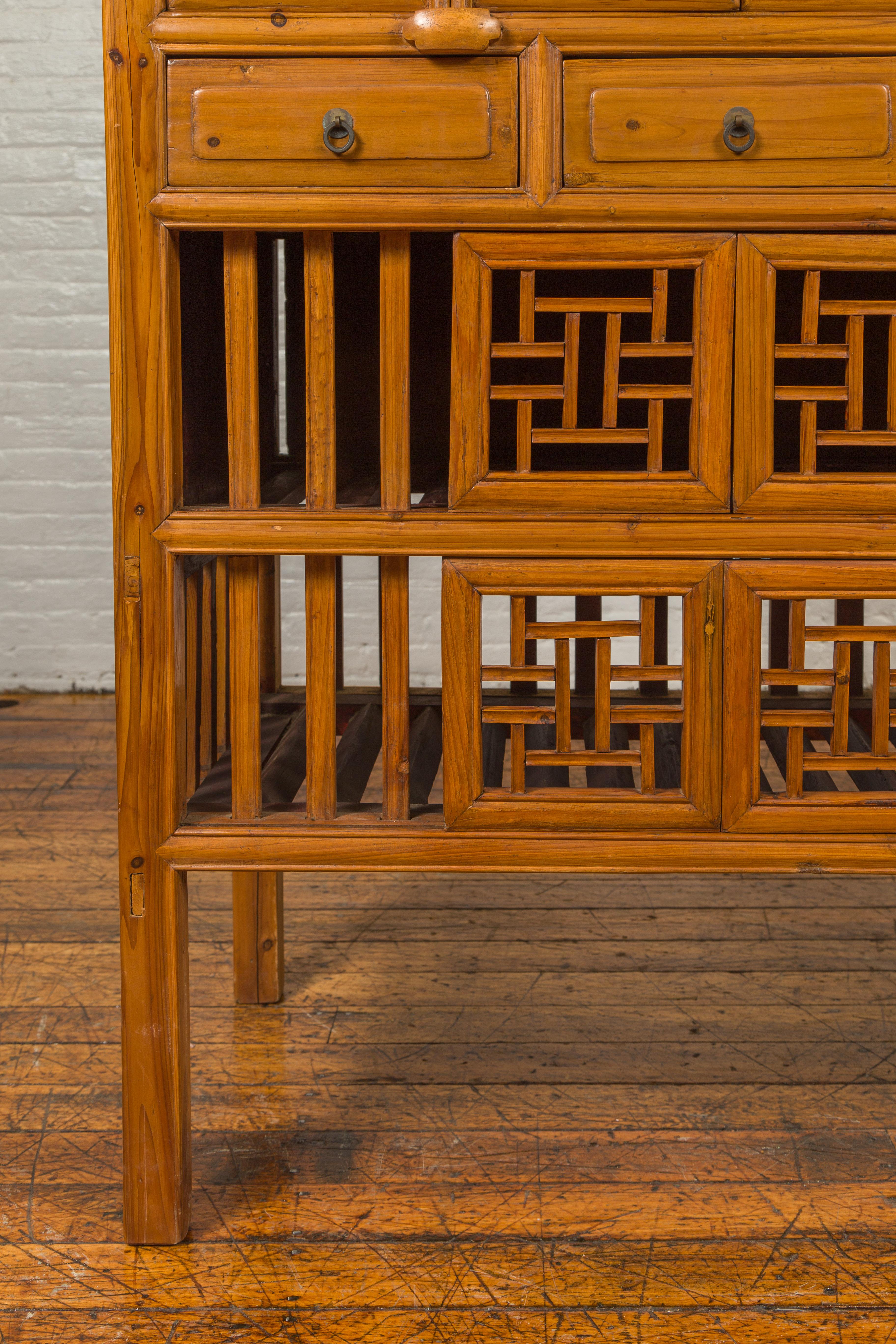 Chinese Qing Dynasty Elm Kitchen Cabinet with Fretwork Motifs and Sliding Panels 2