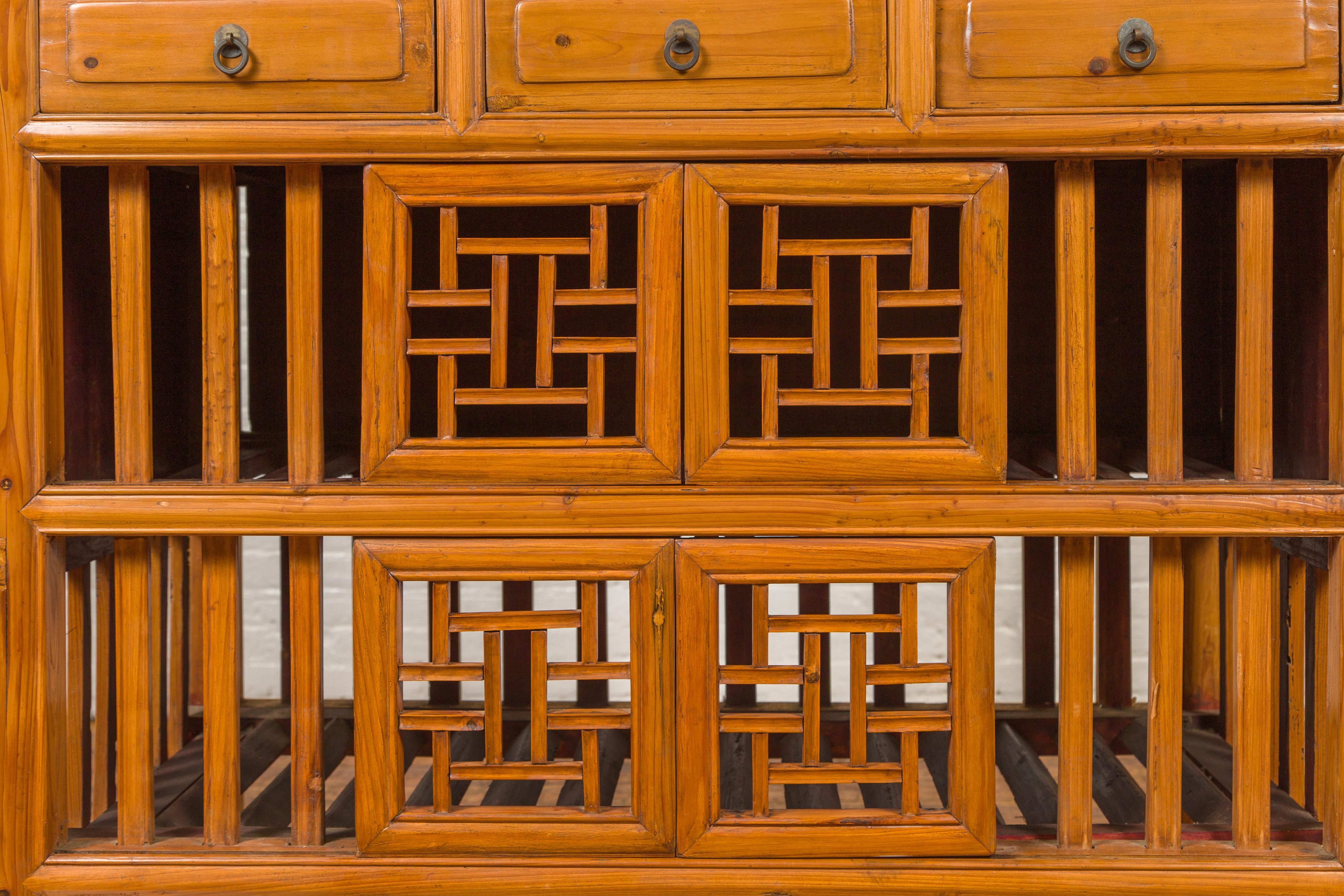 Chinese Qing Dynasty Elm Kitchen Cabinet with Fretwork Motifs and Sliding Panels 5