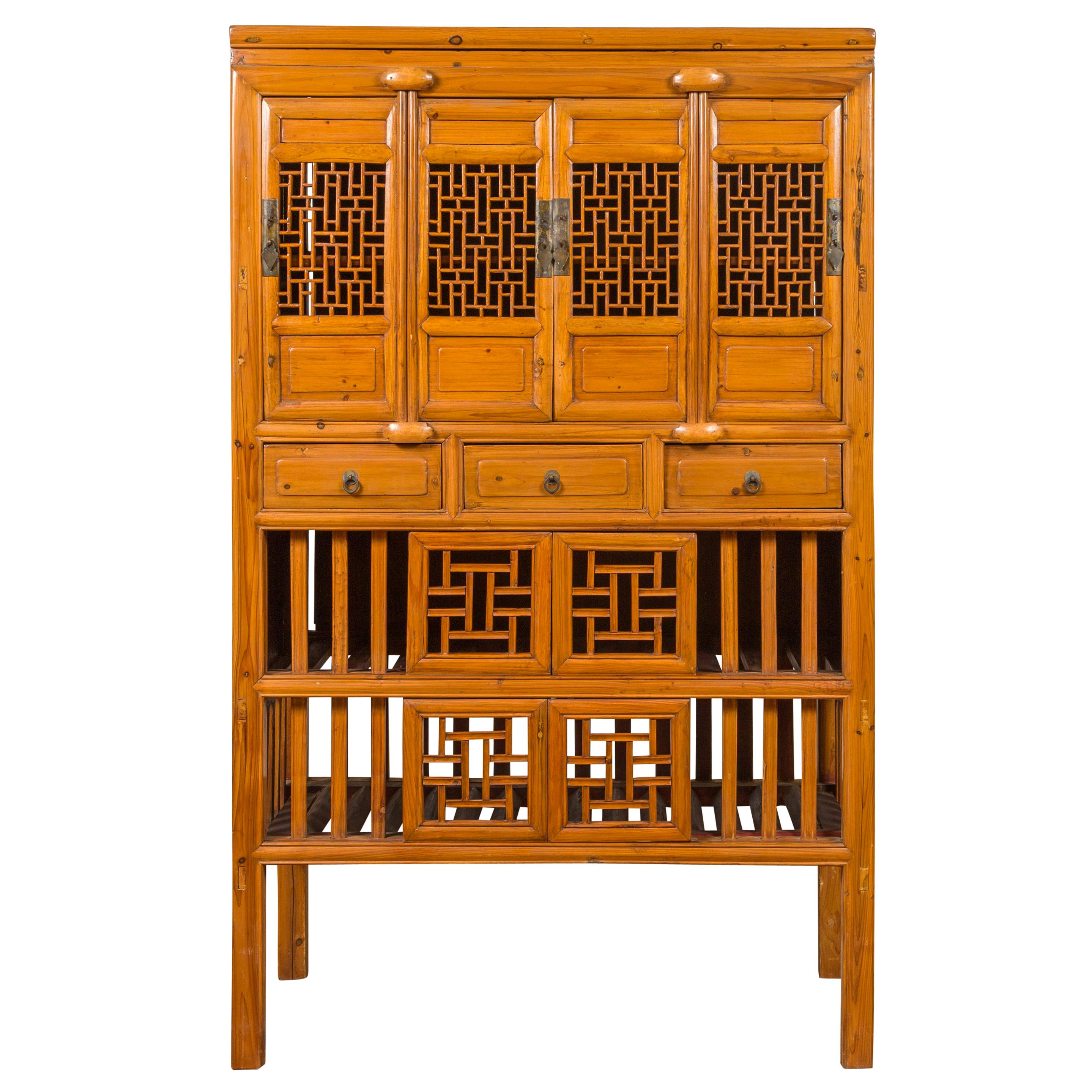 Chinese Qing Dynasty Elm Kitchen Cabinet with Fretwork Motifs and Sliding Panels