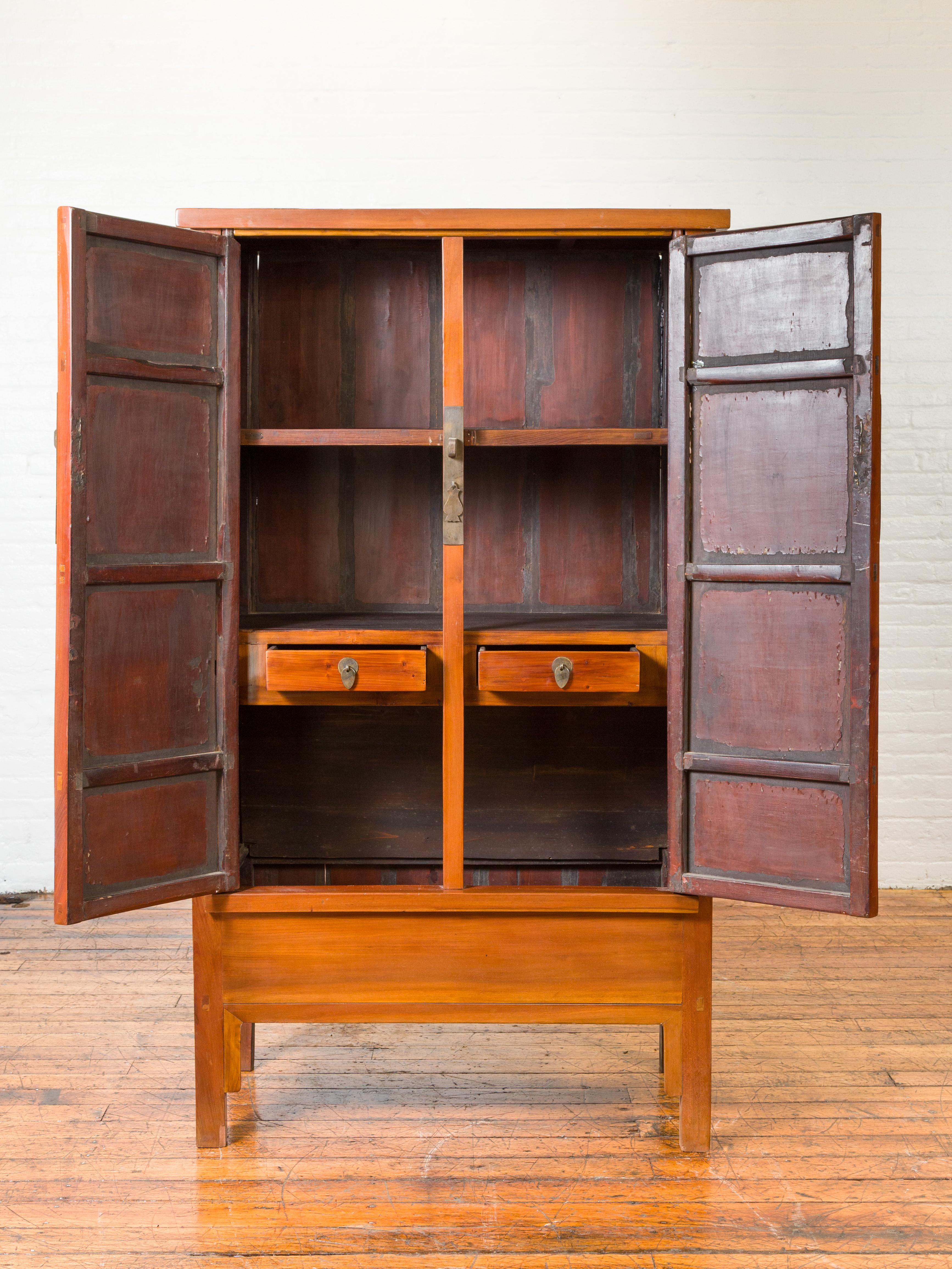 19th Century Chinese Qing Dynasty Elmwood Cabinet with Bronze Medallion and Inner Drawers For Sale