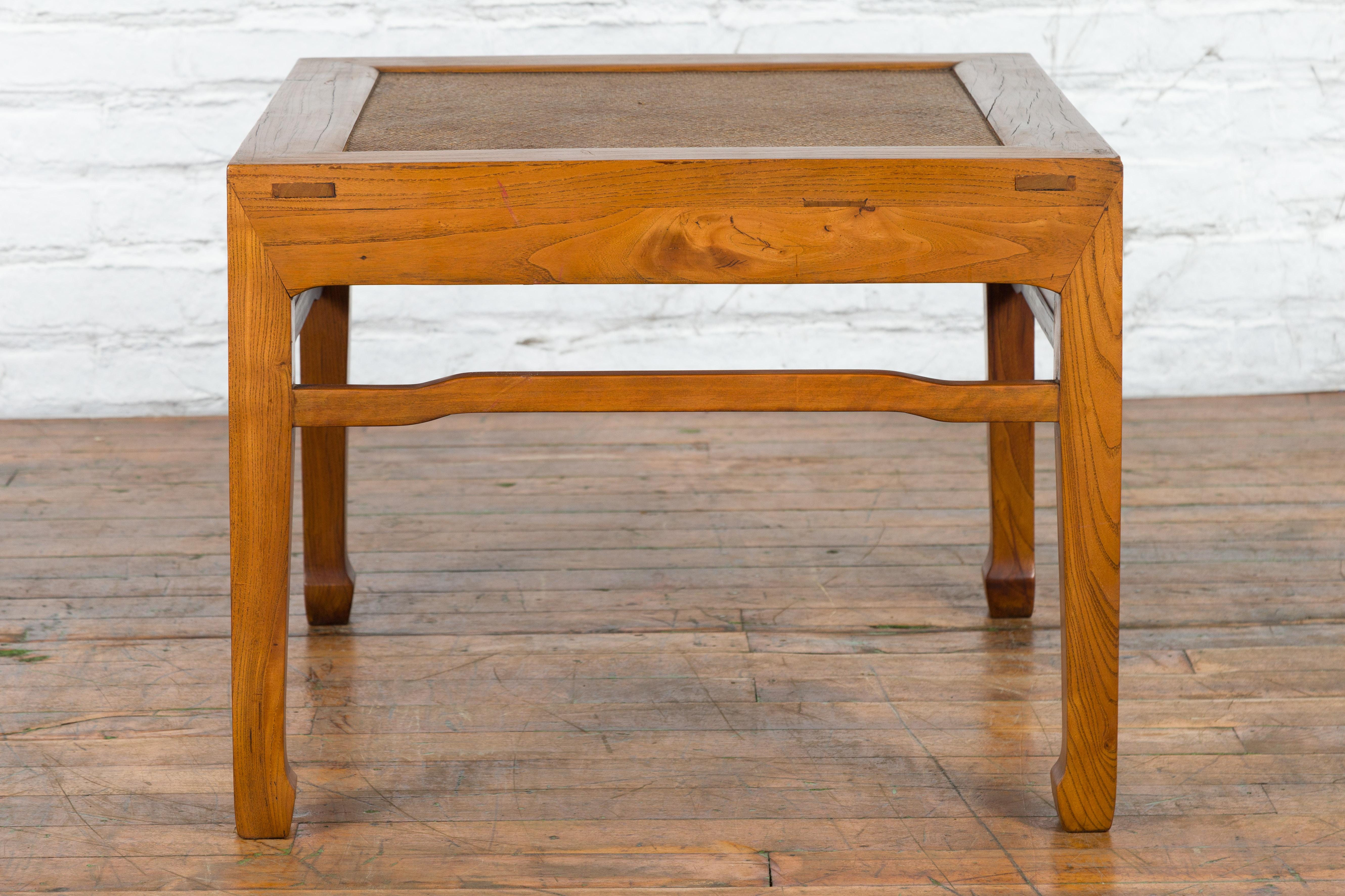 Carved Qing Dynasty Elmwood Side Table with Rattan Top and Humpback Stretchers For Sale