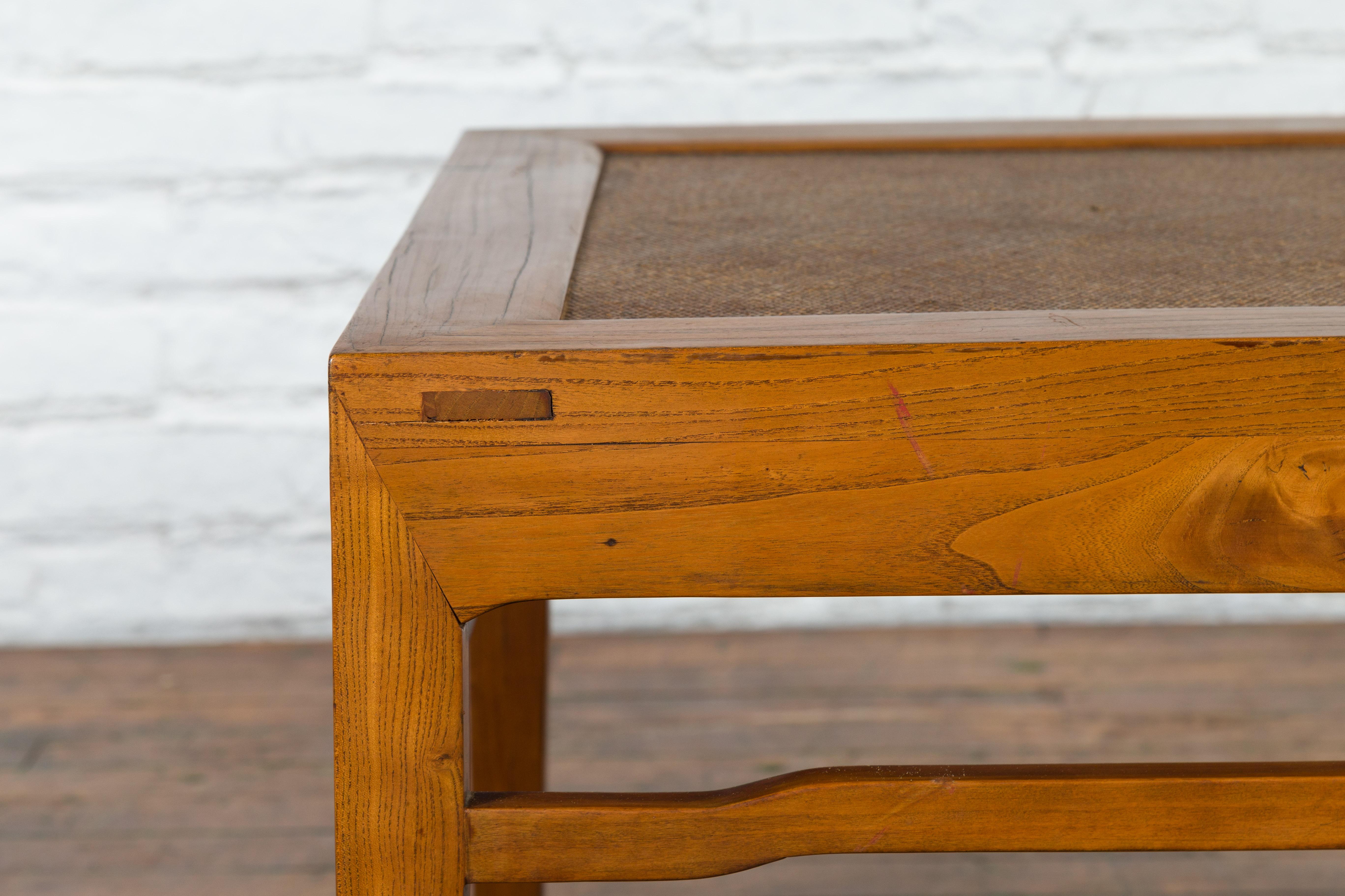 19th Century Qing Dynasty Elmwood Side Table with Rattan Top and Humpback Stretchers For Sale