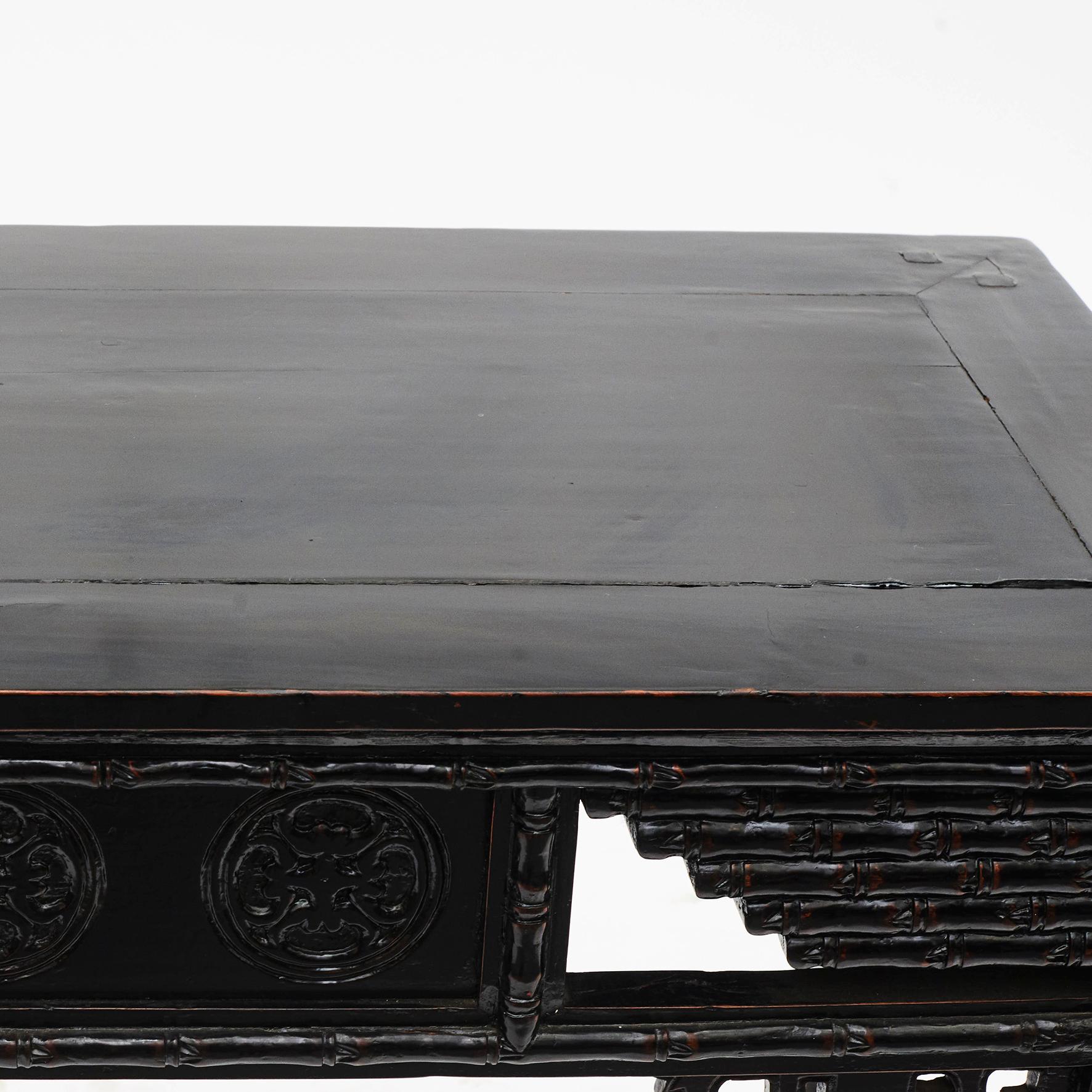 black carved wood console table