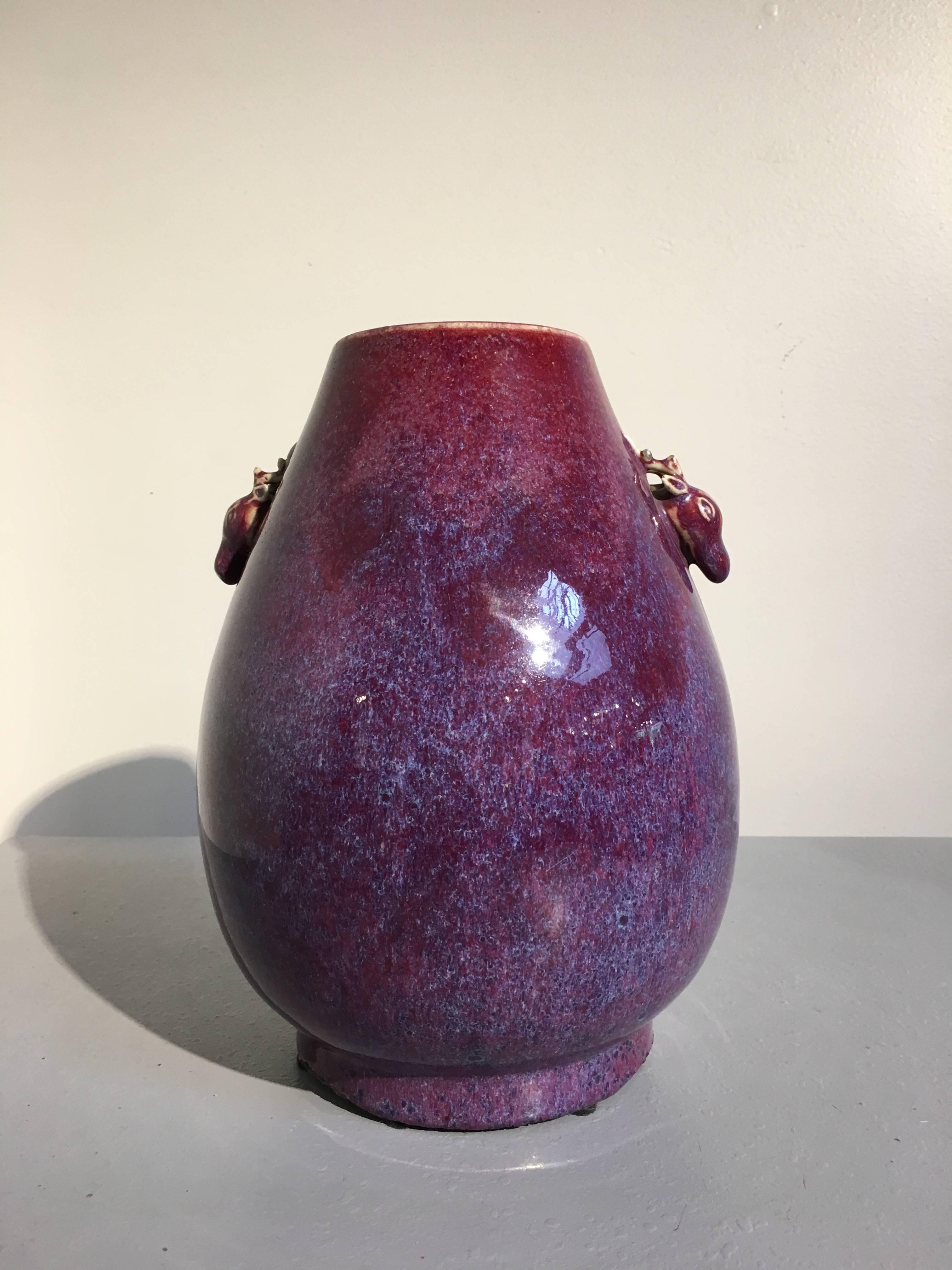 Chinese Qing Dynasty Flambe Glazed Archaistic Hu Vase with Deer Head Handles In Good Condition For Sale In Austin, TX