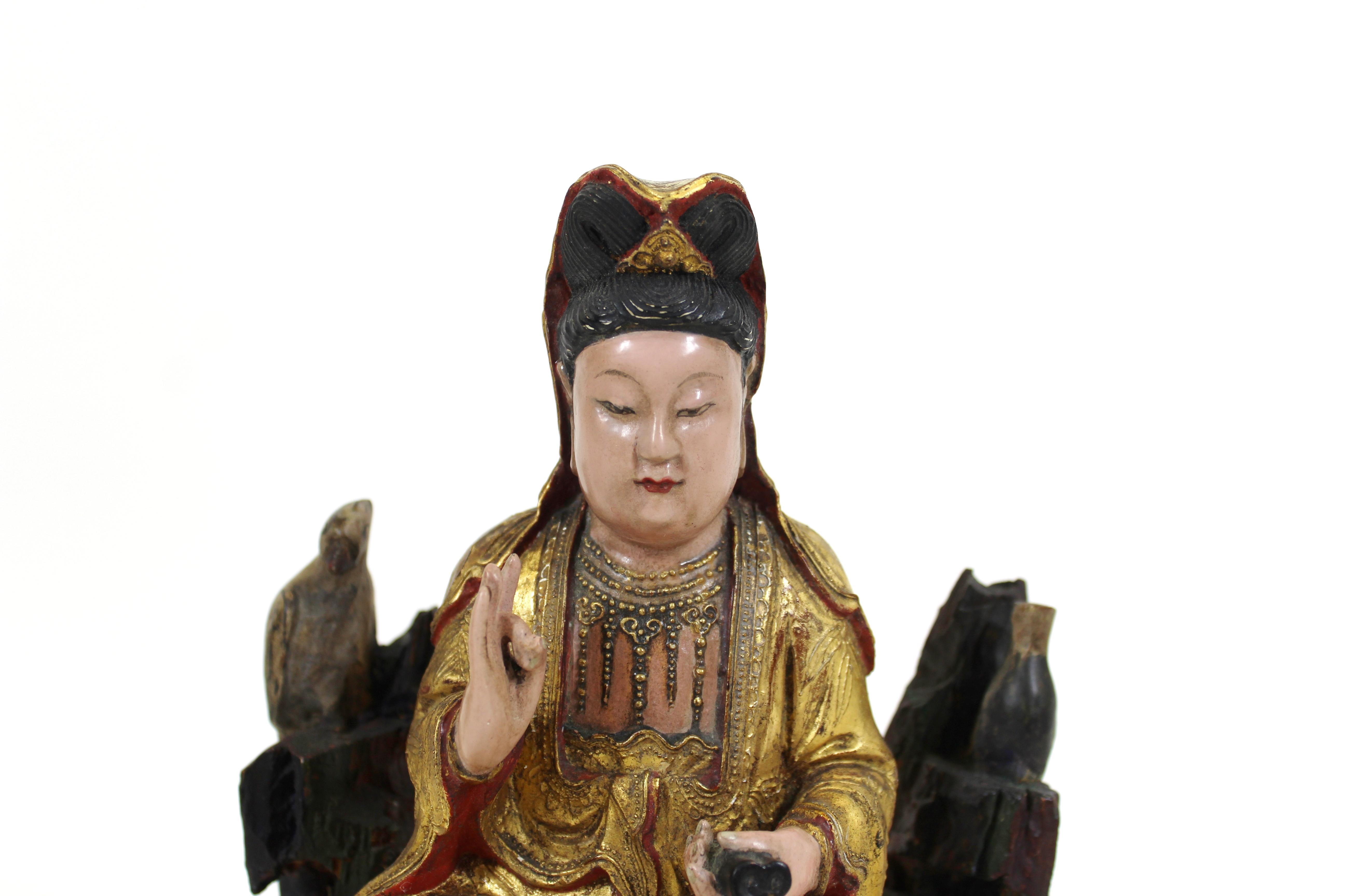 Chinese Qing dynasty goddess Quan Yin carved wood sculpture, polychromed and partially gilt. the piece remains in remarkable antique condition with age-appropriate wear and use.