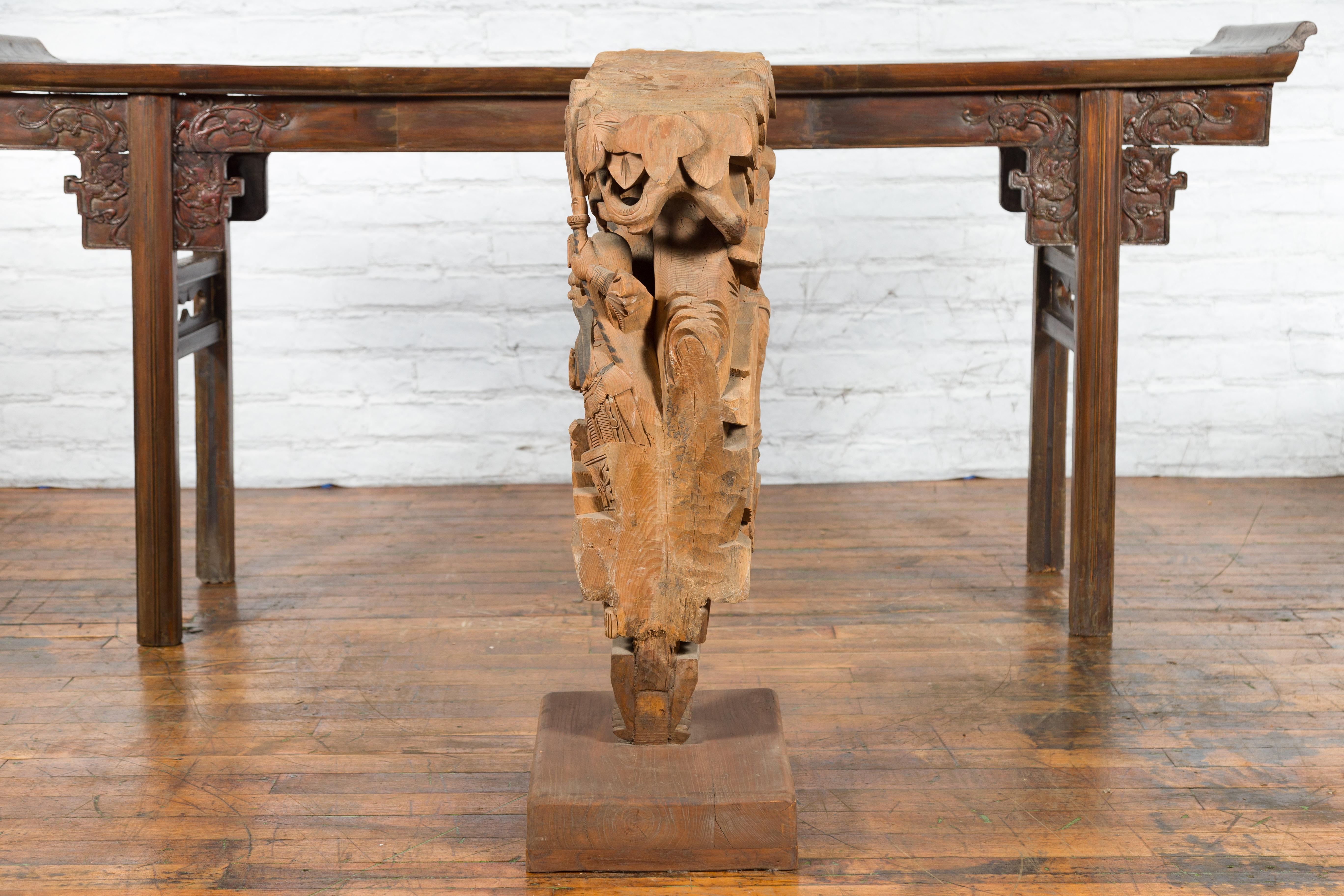 Chinese Qing Dynasty Hand-Carved Wooden Temple Corbel with Detailed Figures For Sale 9