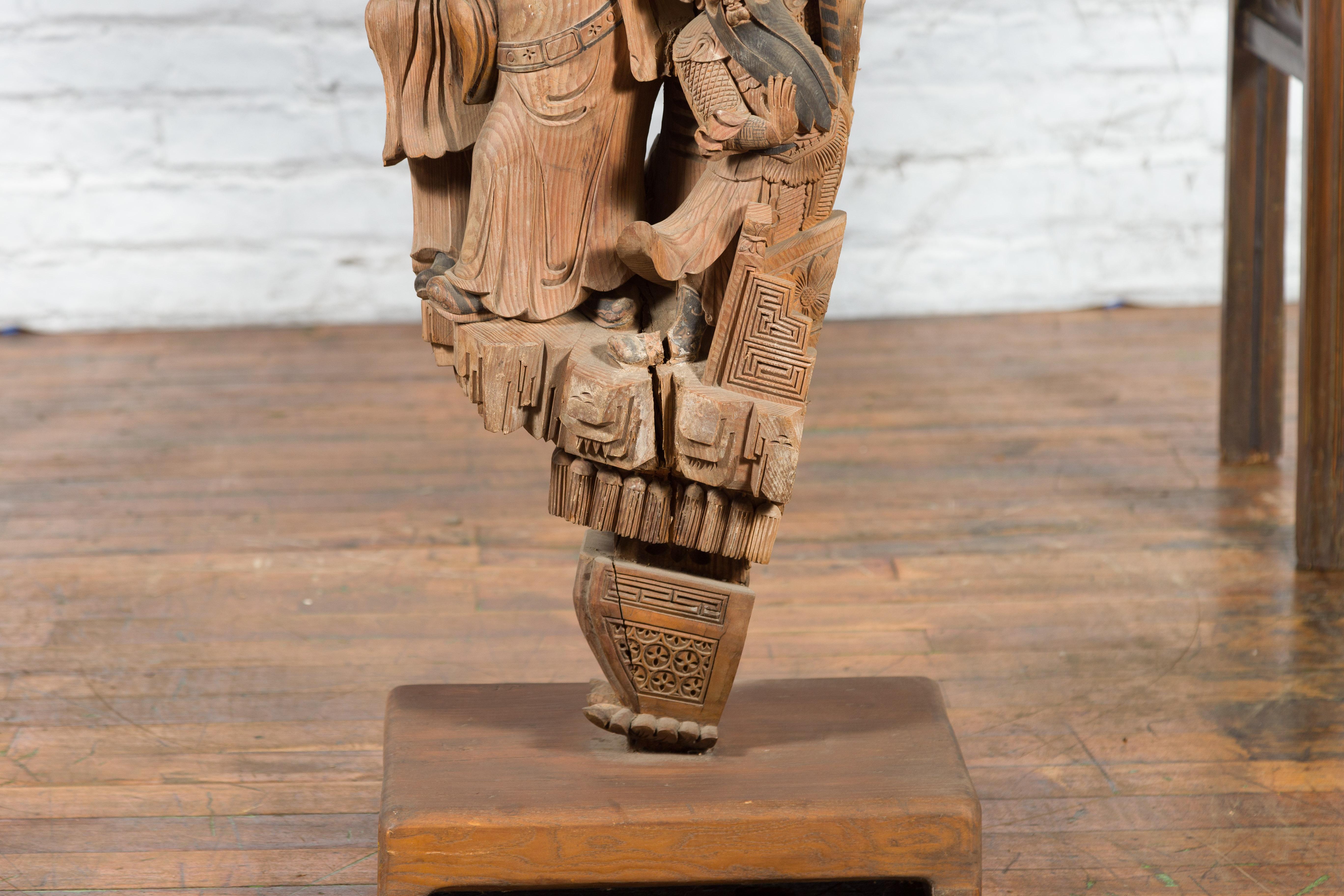 Chinese Qing Dynasty Hand-Carved Wooden Temple Corbel with Detailed Figures For Sale 11