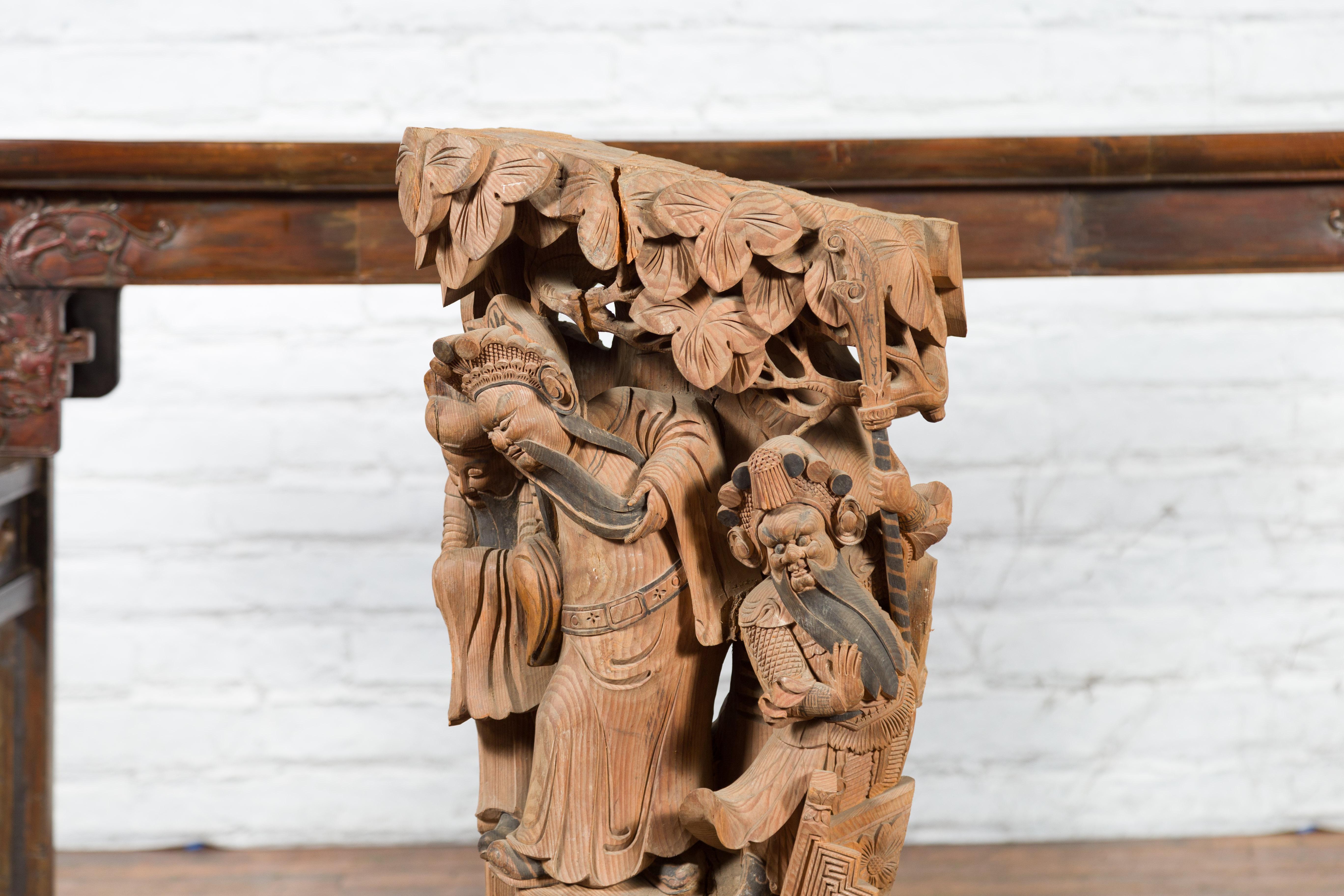 Chinese Qing Dynasty Hand-Carved Wooden Temple Corbel with Detailed Figures In Good Condition For Sale In Yonkers, NY