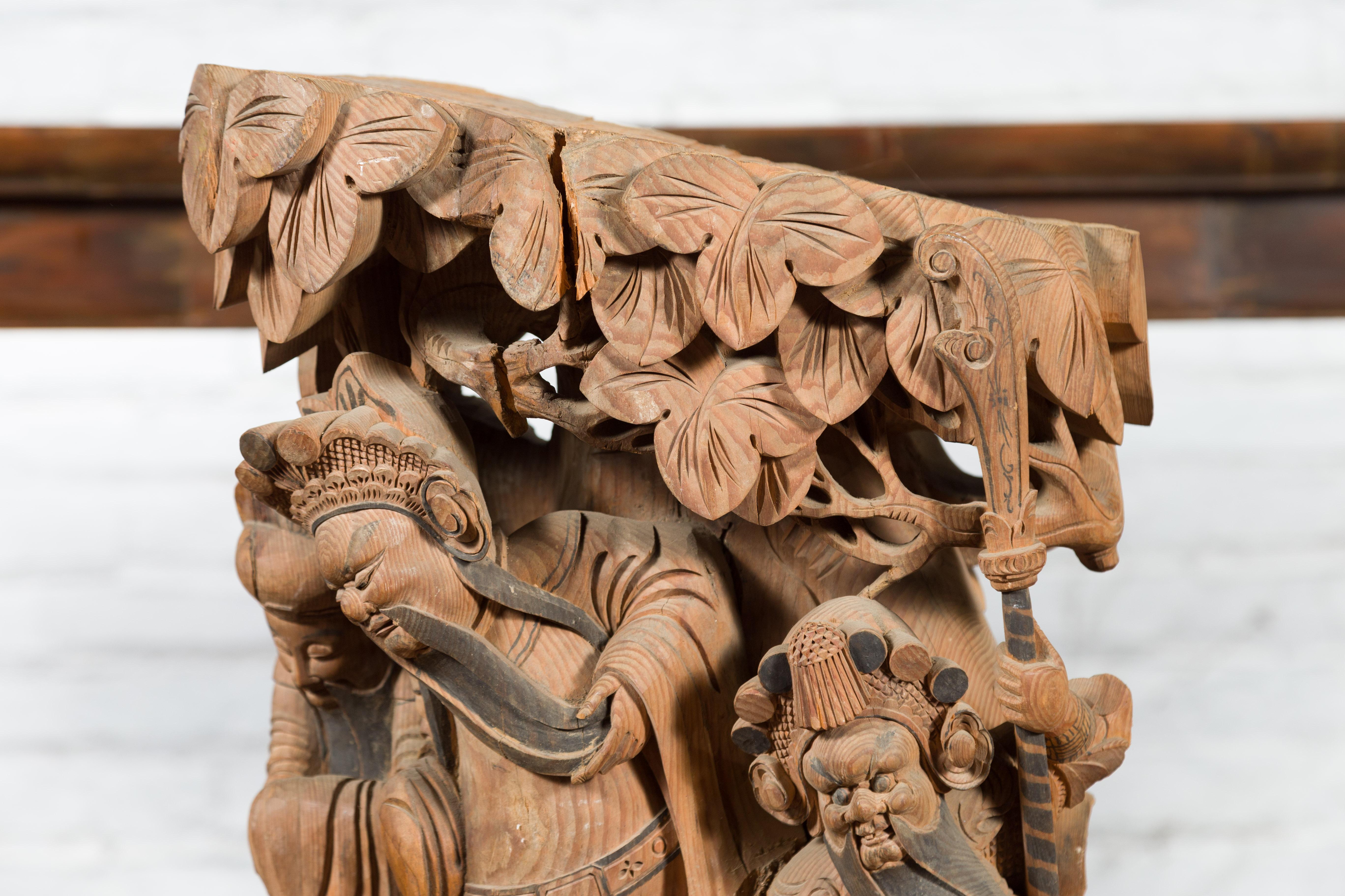 Chinese Qing Dynasty Hand-Carved Wooden Temple Corbel with Detailed Figures For Sale 2