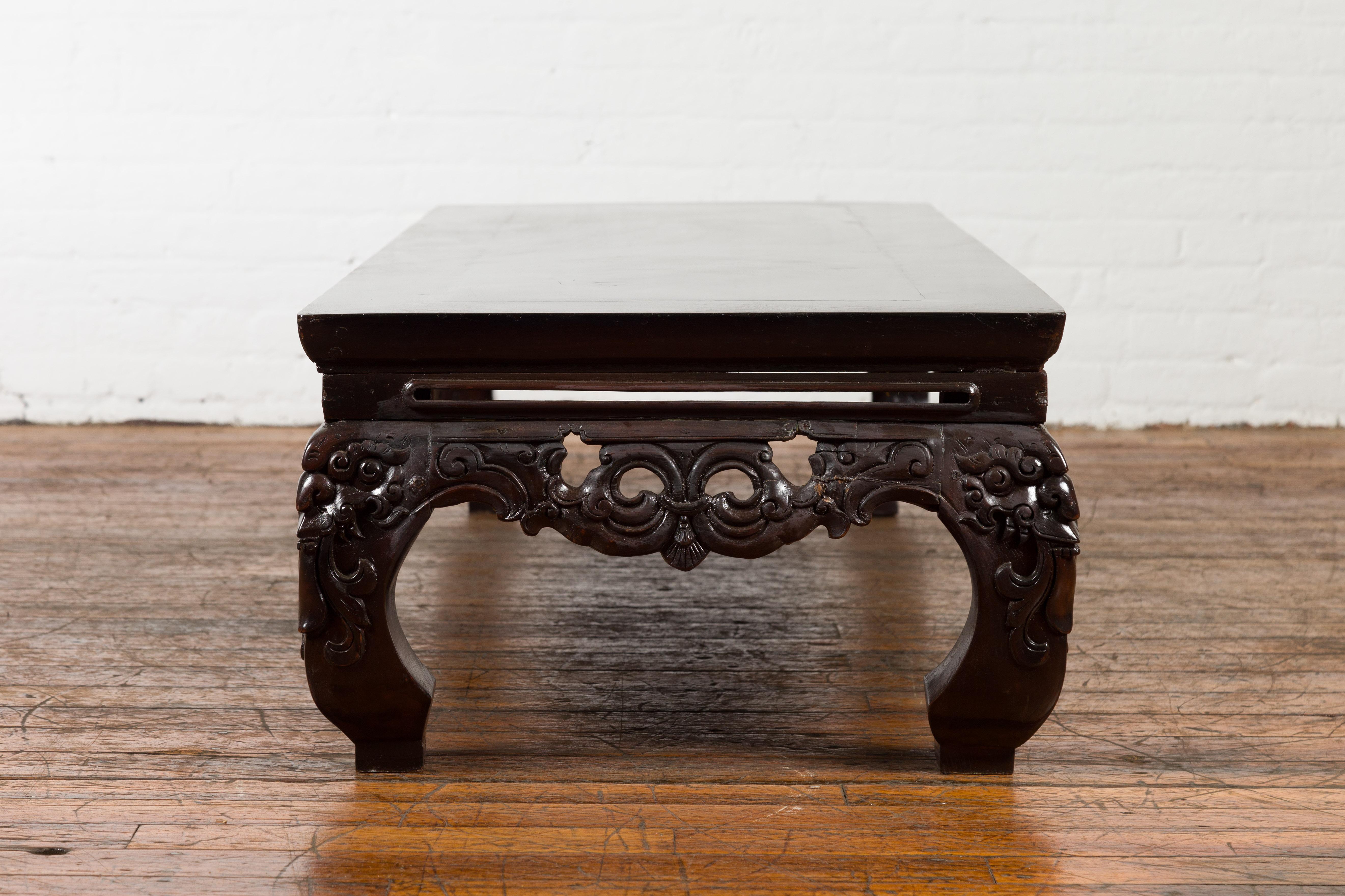 Chinese Qing Dynasty Low Kang Coffee Table with Carved Apron and Dark Lacquer For Sale 14