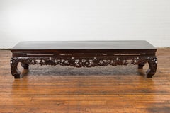 Qing Dynasty Low Kang Coffee Table with Carved Apron and Dark Lacquer
