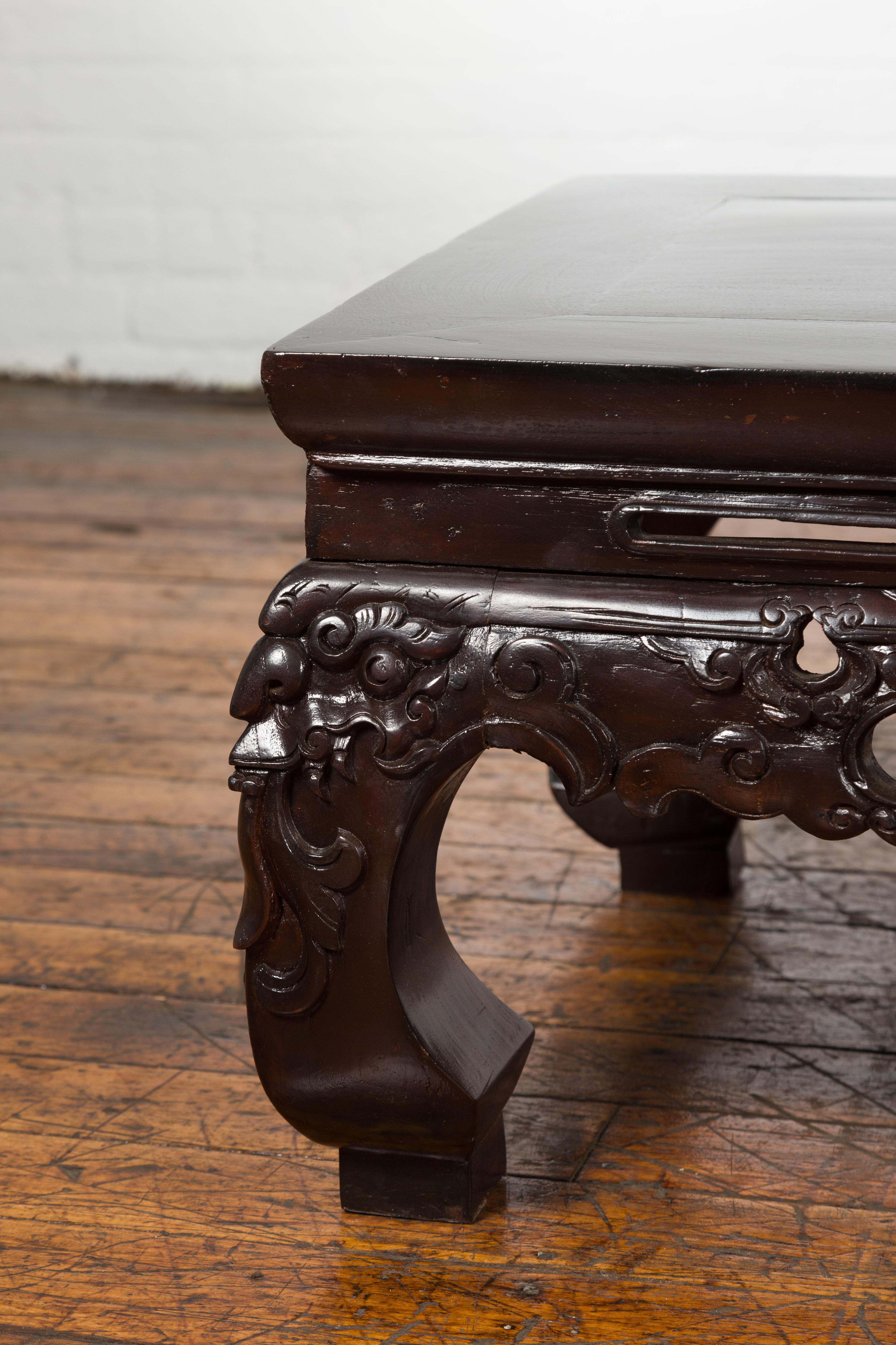 Qing Dynasty Low Kang Coffee Table with Carved Apron and Dark Lacquer For Sale 1