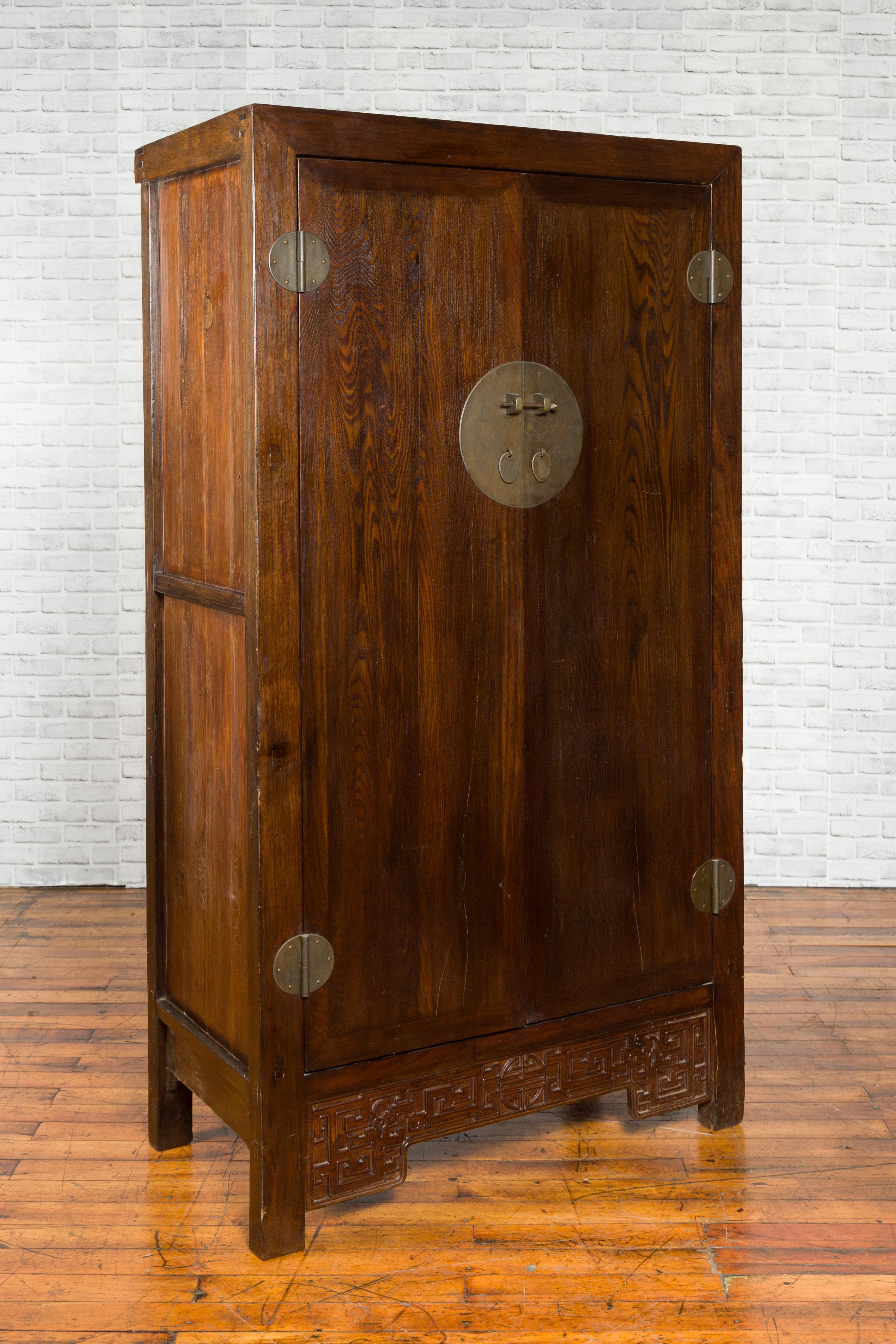 Chinese Qing Dynasty Period 19th Century Brown Cabinet with Carved Apron In Good Condition For Sale In Yonkers, NY