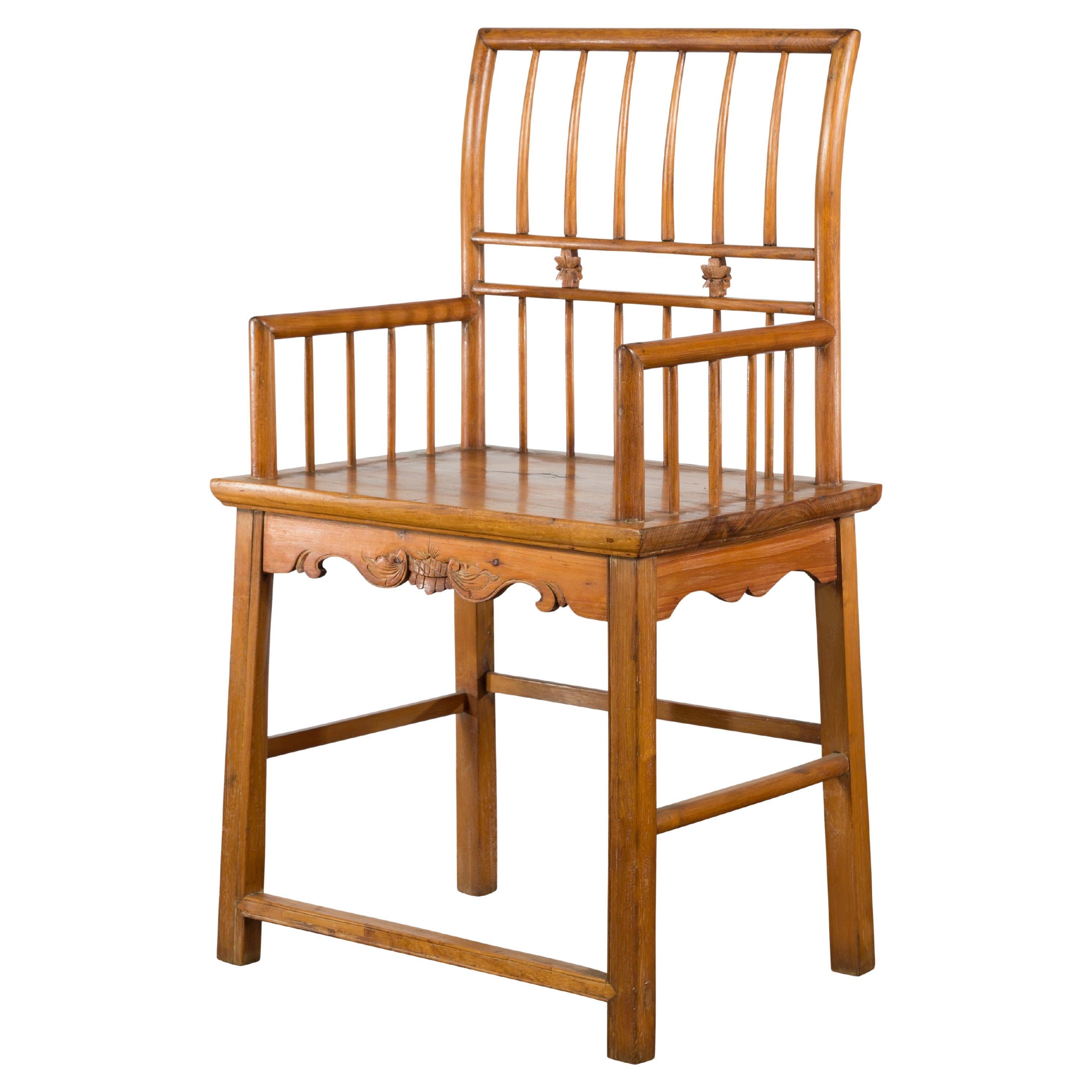 Chinese Qing Dynasty Period 19th Century Elmwood Armchair with Hand-Carved Apron For Sale