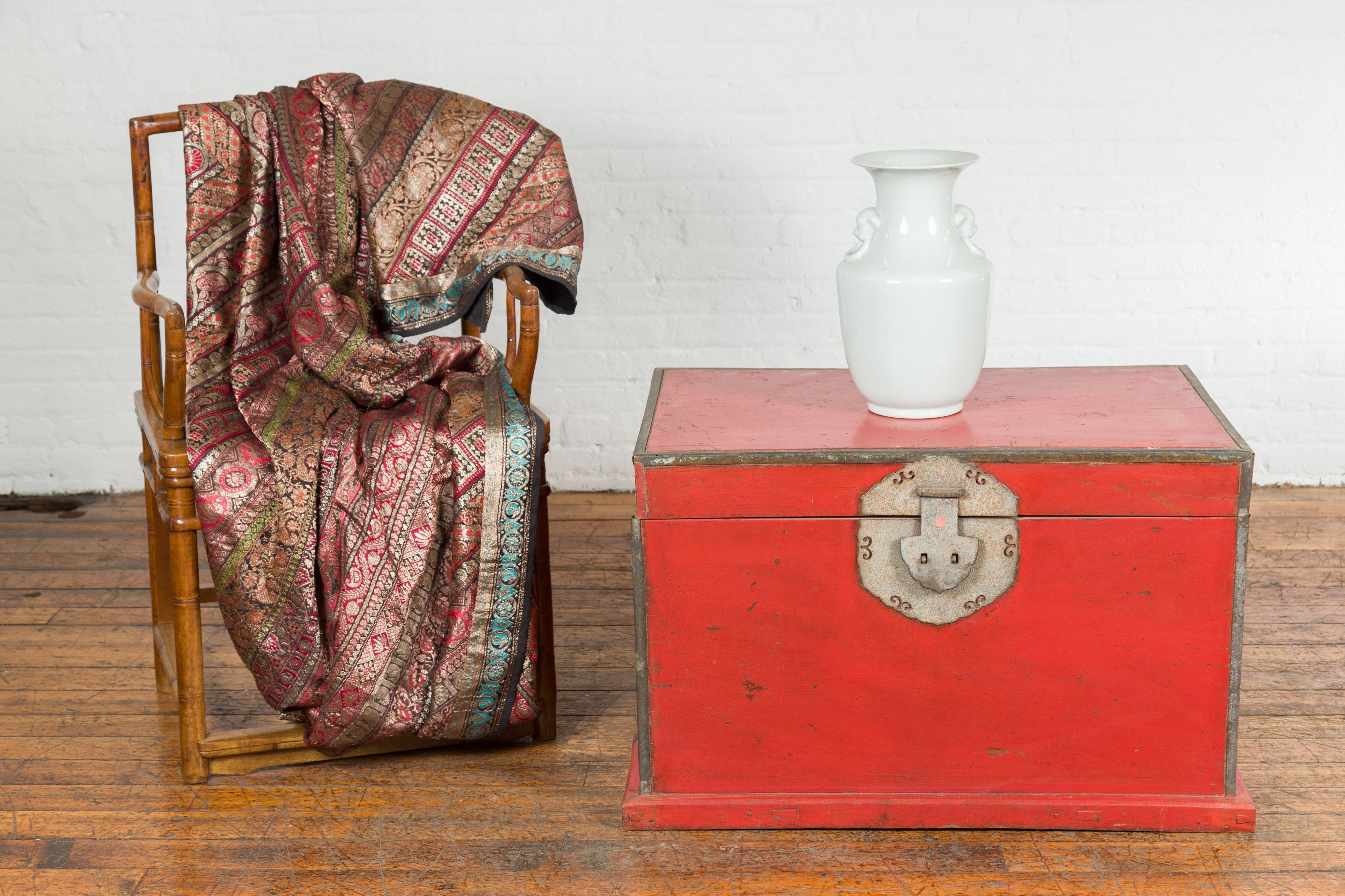 Lacquered Chinese Qing Dynasty Period 19th Century Red Lacquer Trunk with Metal Edging For Sale