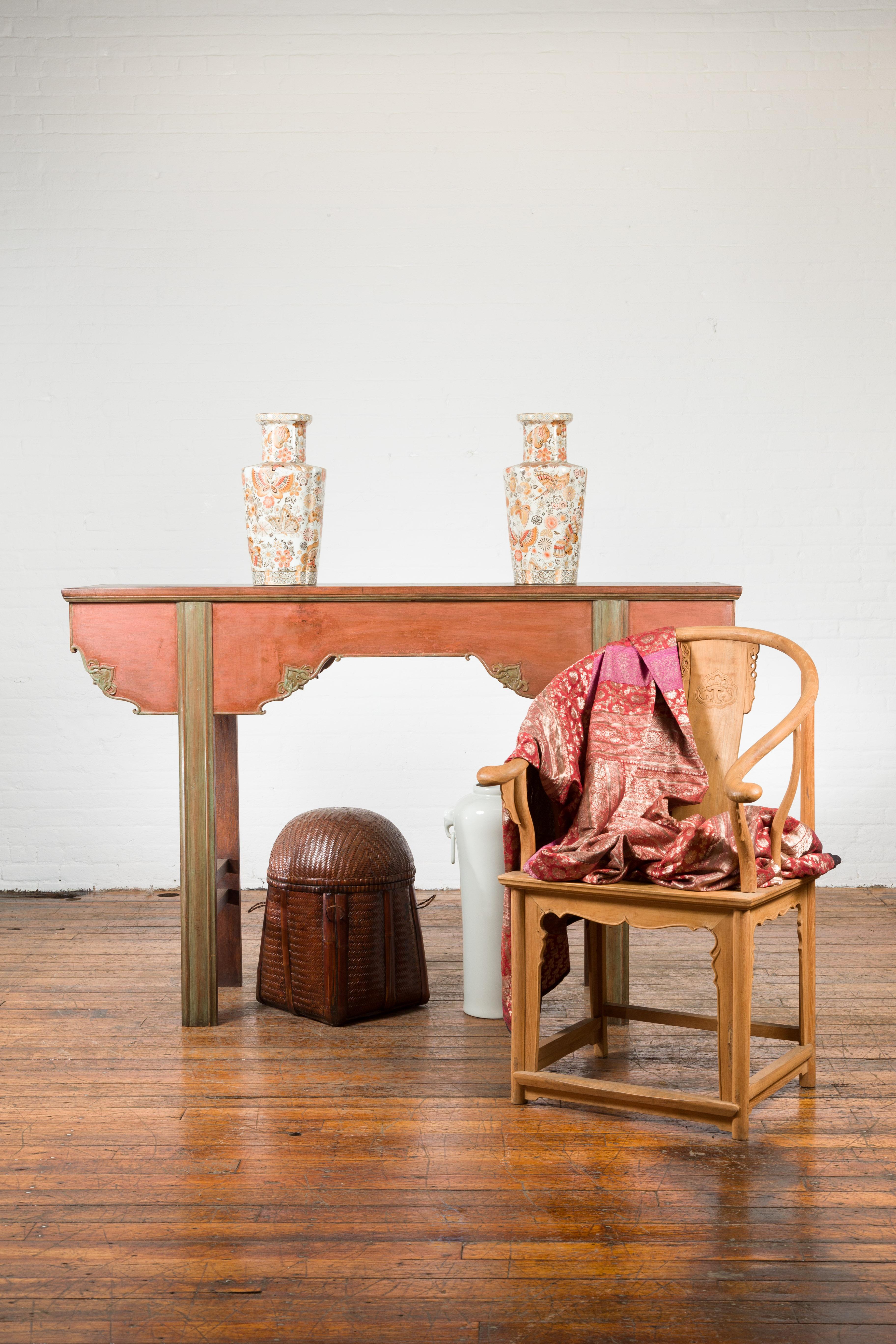 A tall Chinese altar console table with soft red and green tones, shaped apron, and stretchered legs. The table’s clean lines and elevated height give it a distinct presence, ideal for entryways or spaces in need of vertical emphasis. The
