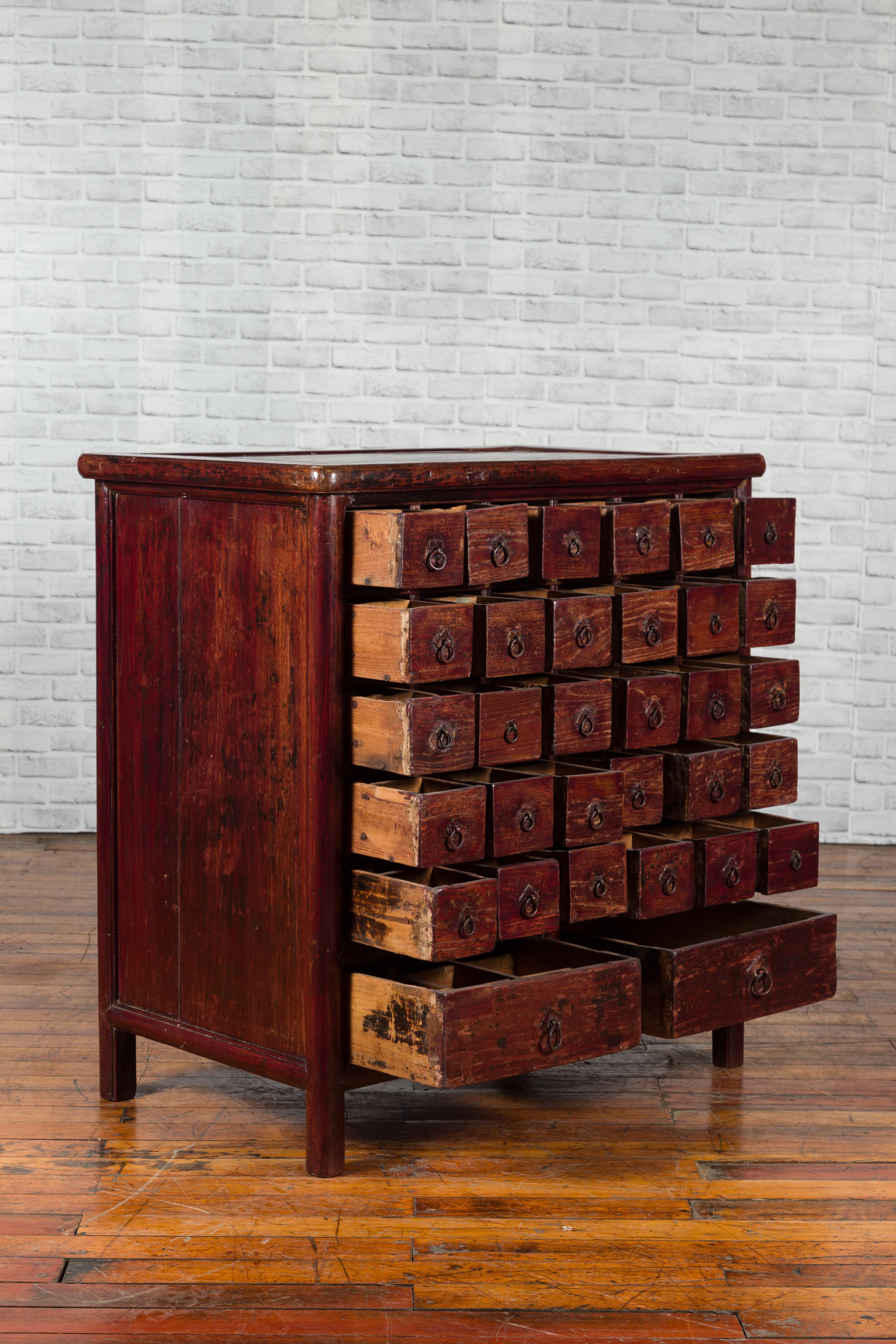 Chinese Qing Dynasty Period Apothecary Chest with 32 Drawers and Aged Patina In Good Condition For Sale In Yonkers, NY