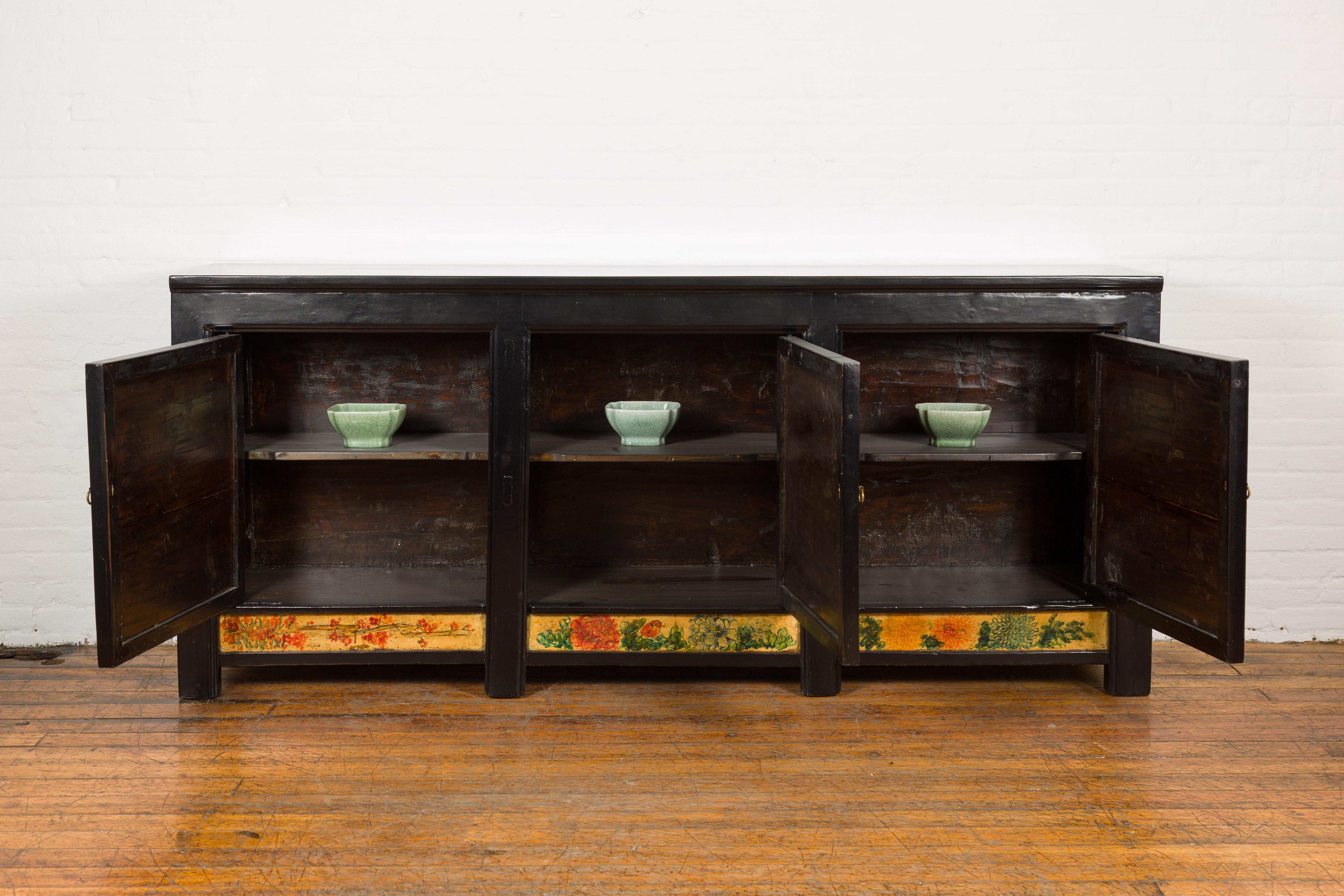Chinese Low Yellow and Black Cabinet with Three Door Paintings For Sale