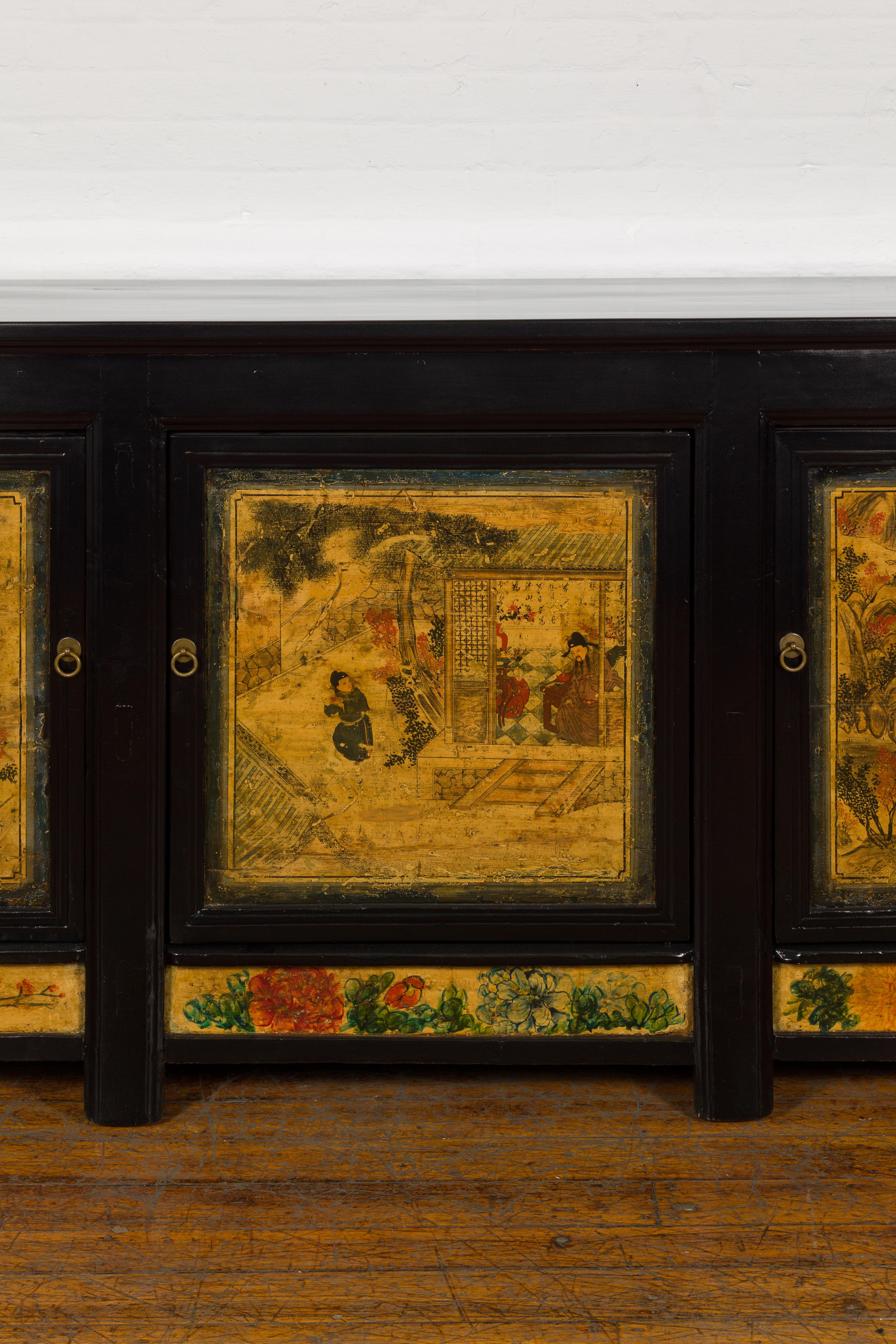 Low Yellow and Black Cabinet with Three Door Paintings In Good Condition For Sale In Yonkers, NY