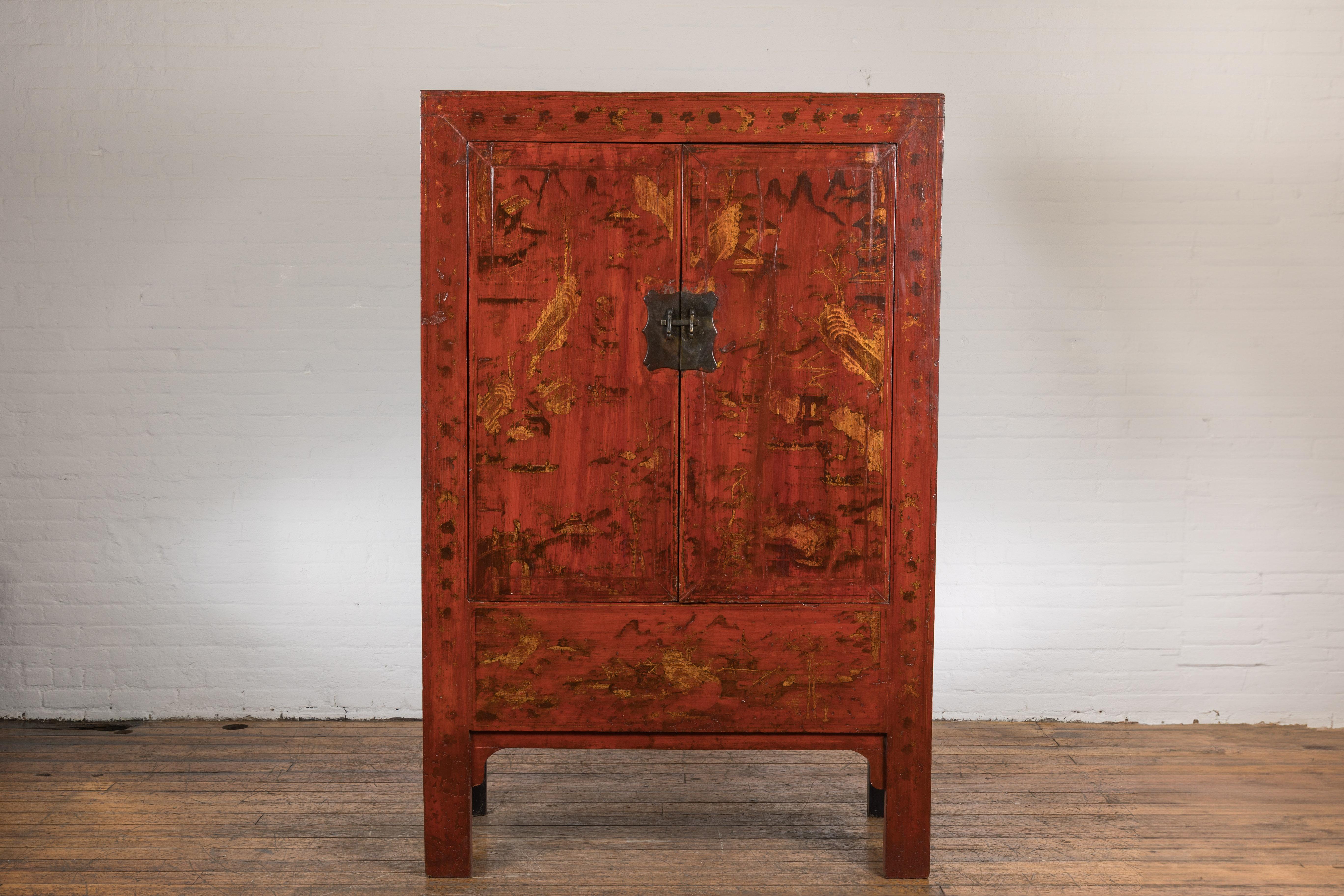 A Chinese Qing Dynasty period red lacquer cabinet from the 19th century with hand-painted gilded scenes. Gracing us with its oriental opulence, this Chinese Qing Dynasty period red lacquer cabinet, born in the 19th century, is a treasure trove of
