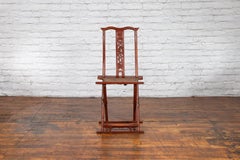 Chaise pliante de voyage en laque rouge de la Dynastie Qing avec assise tissée