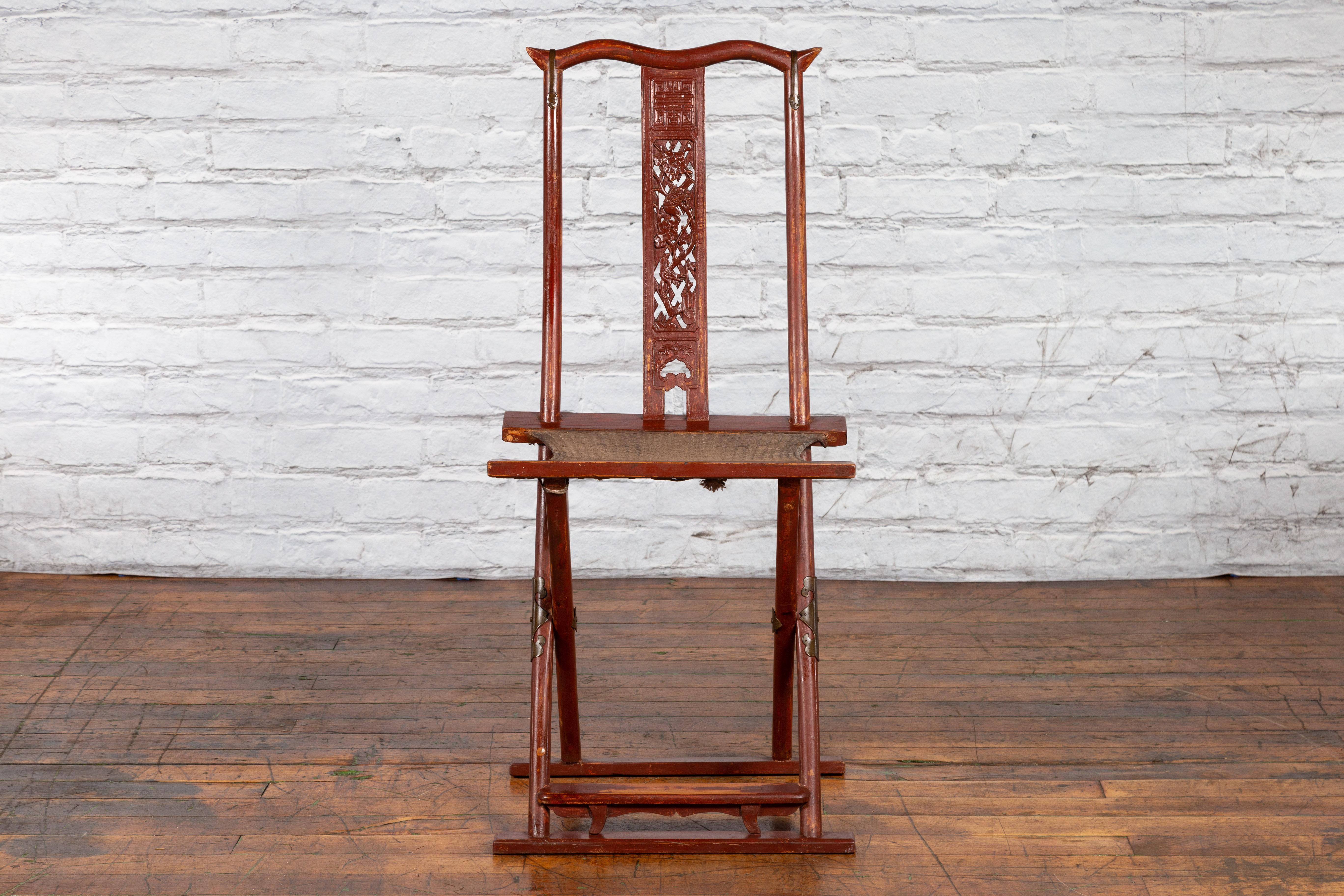 Carved Chinese Qing Dynasty Red Lacquer Traveller's Folding Chair with Woven Seat For Sale