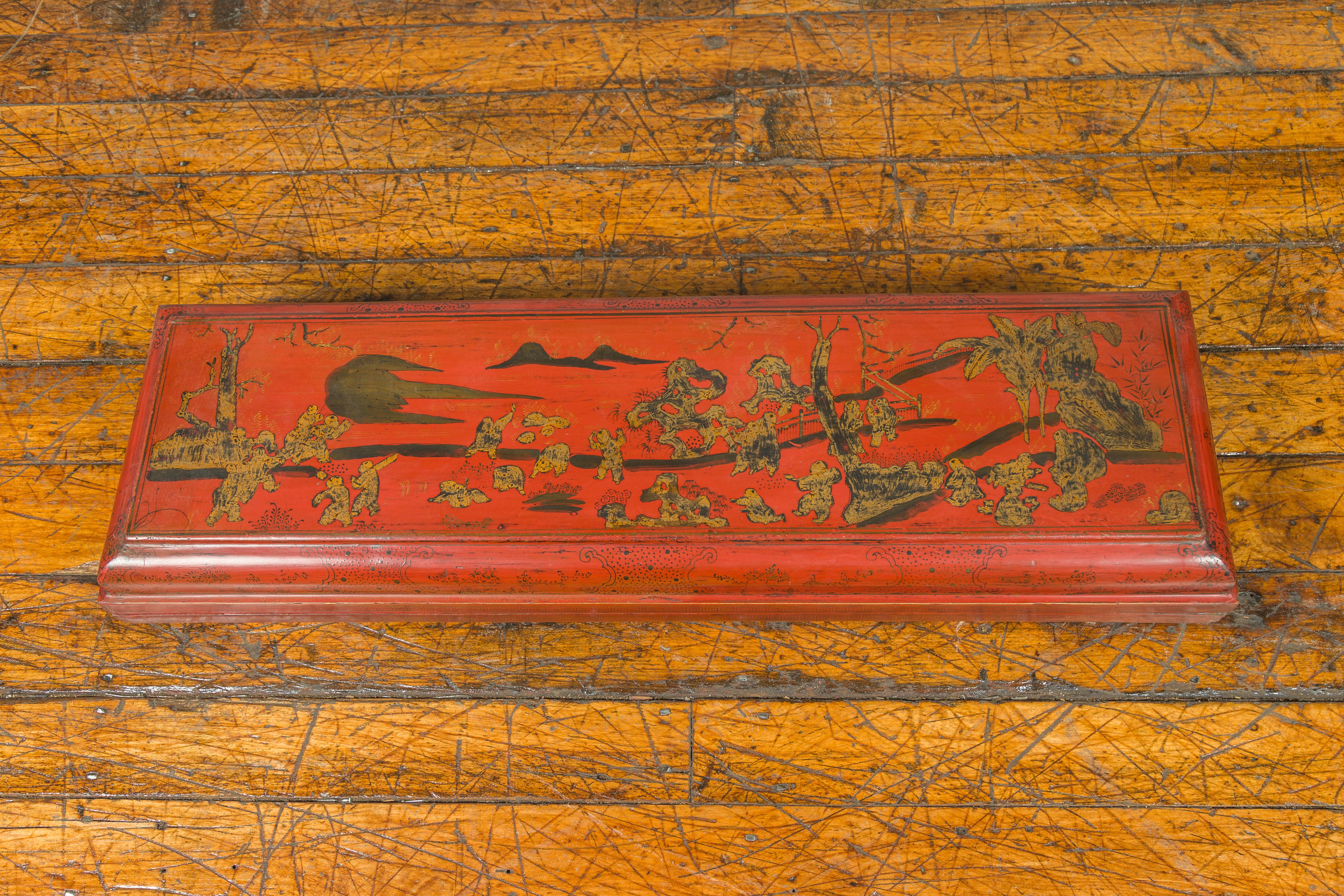 Chinese Qing Dynasty Red Lacquered Scroll Box with Distressed Gold Chinoiserie Décor For Sale