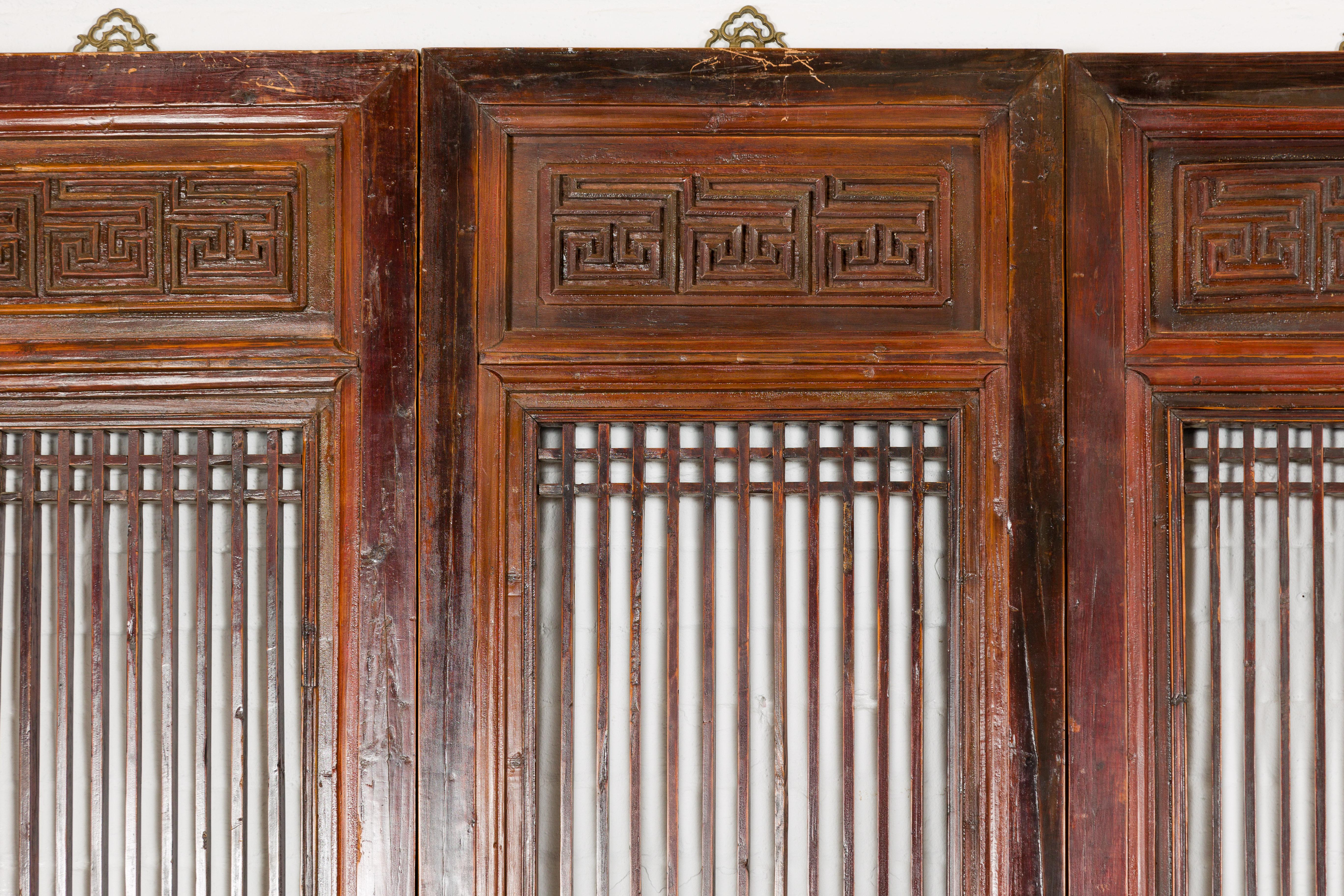 Wood Chinese Qing Dynasty Six-Panel Lacquered Screen with Carved Meander Motifs For Sale