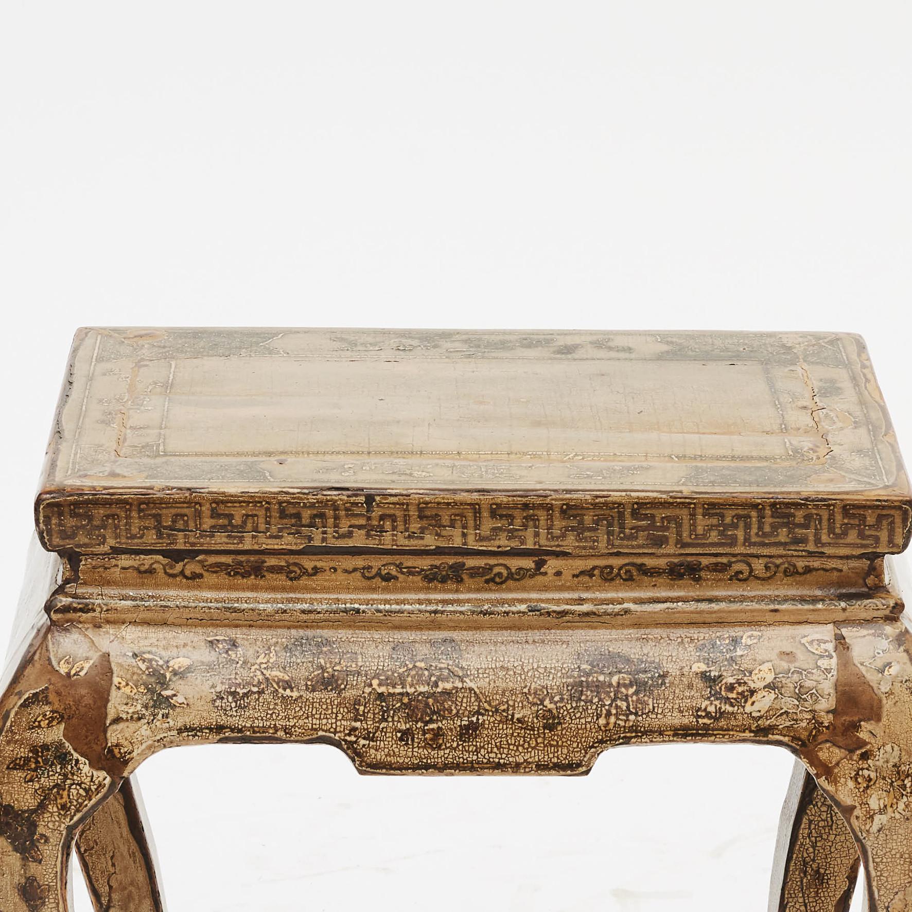 A charming stool with original vanilla-colored lacquer and remnants of decorations. Beautiful age-related patina, China, circa 1900.
Provenance: Wava Kitty Countess Armfelt, personal friend to Chamberlaine and lady in waiting for HM Queen Margrethe