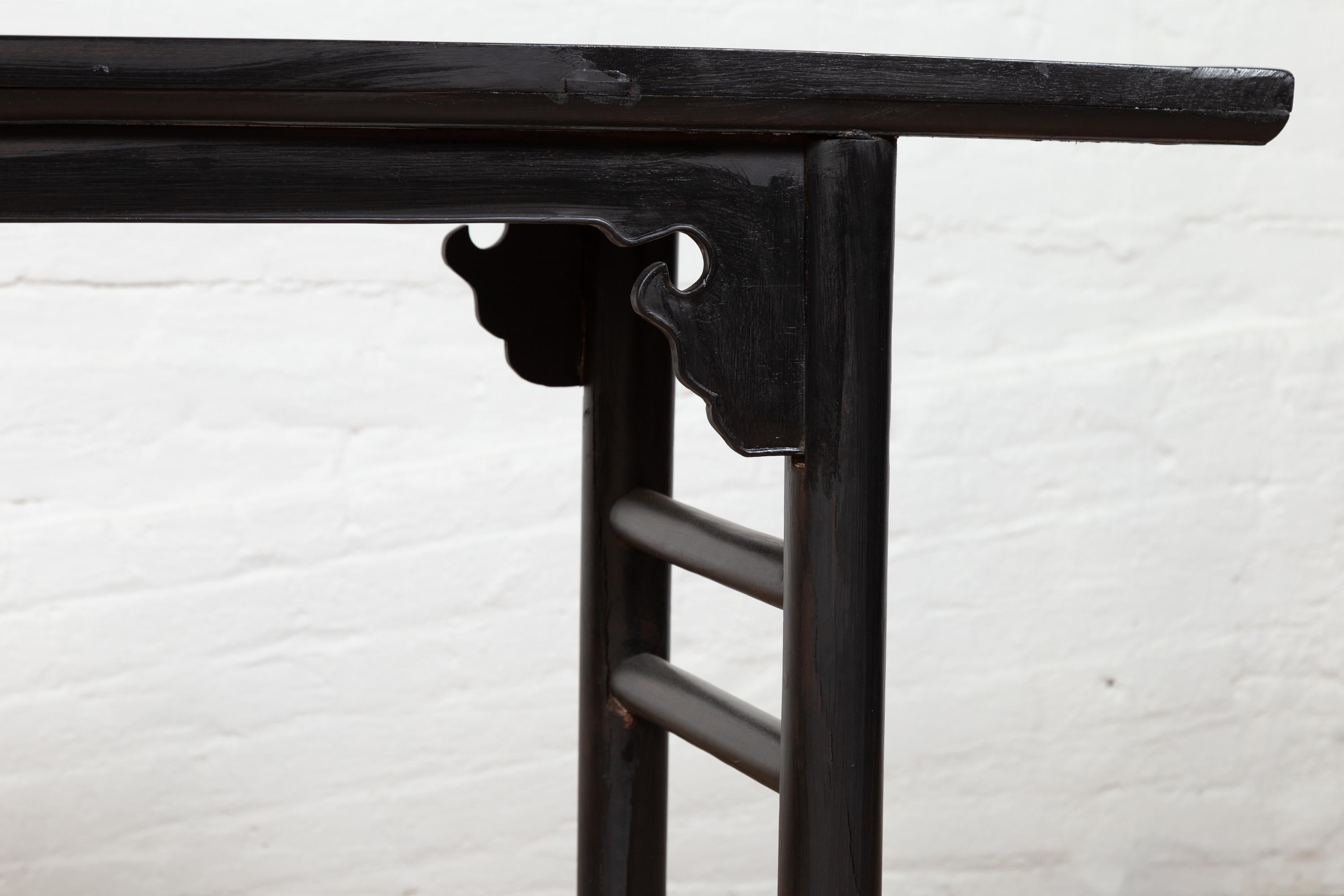 20th Century Chinese Qing Dynasty Style Black Altar Console Table with Cloud-Shaped Spandrels