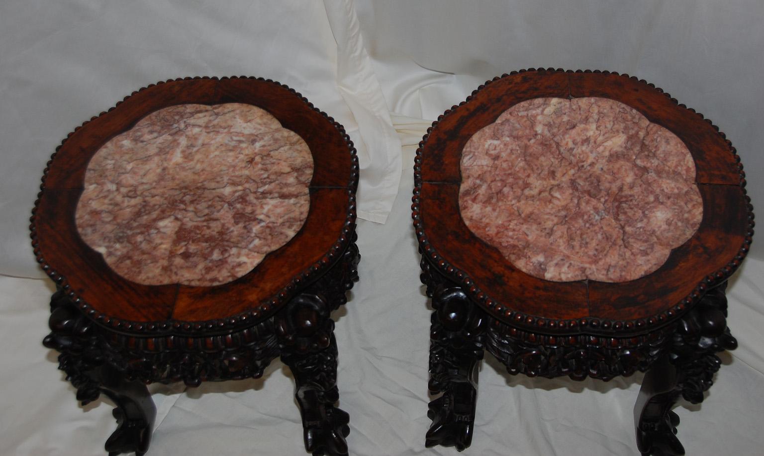 Chinese Qing period pair of rosewood hand carved stools with rose marble lobed inlay to the top of each stool. These quite substantial stools make wonderful side tables next to a chair, or as an extra place to sit, or as a handsome plant or