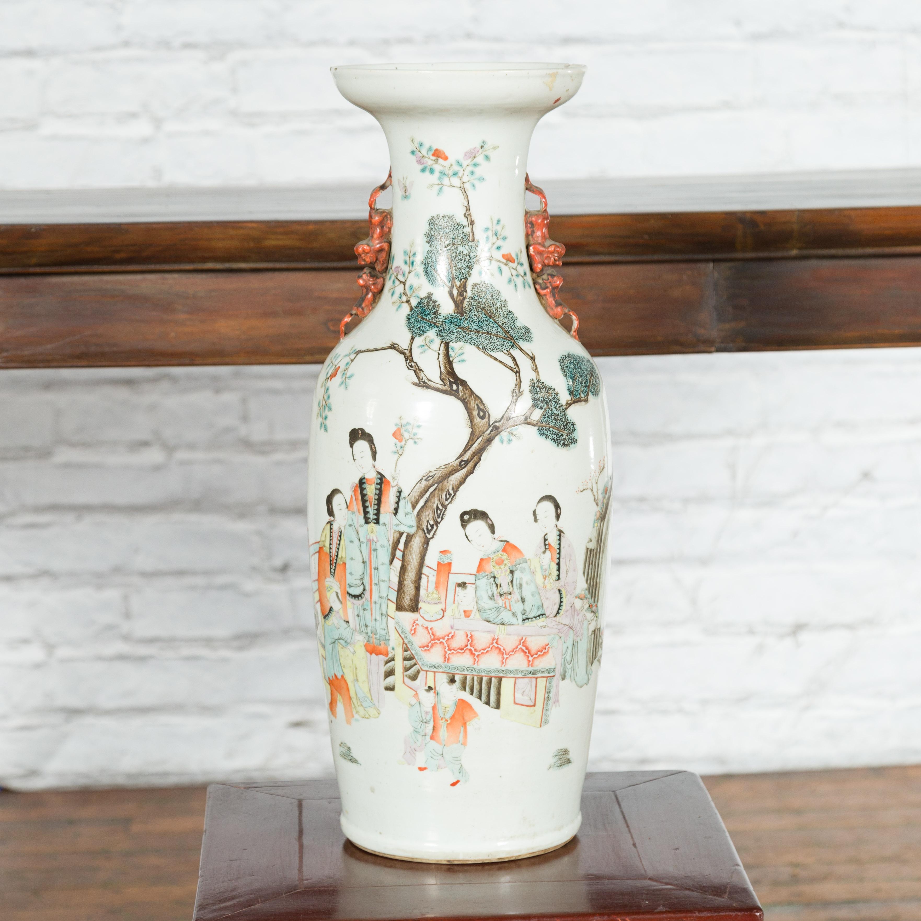 A Chinese Qing Dynasty period porcelain altar vase from the 19th century with hand-painted figures and calligraphy décor. Created in China during the Qing Dynasty period in the 19th century, this porcelain altar vase features a nicely flaring neck