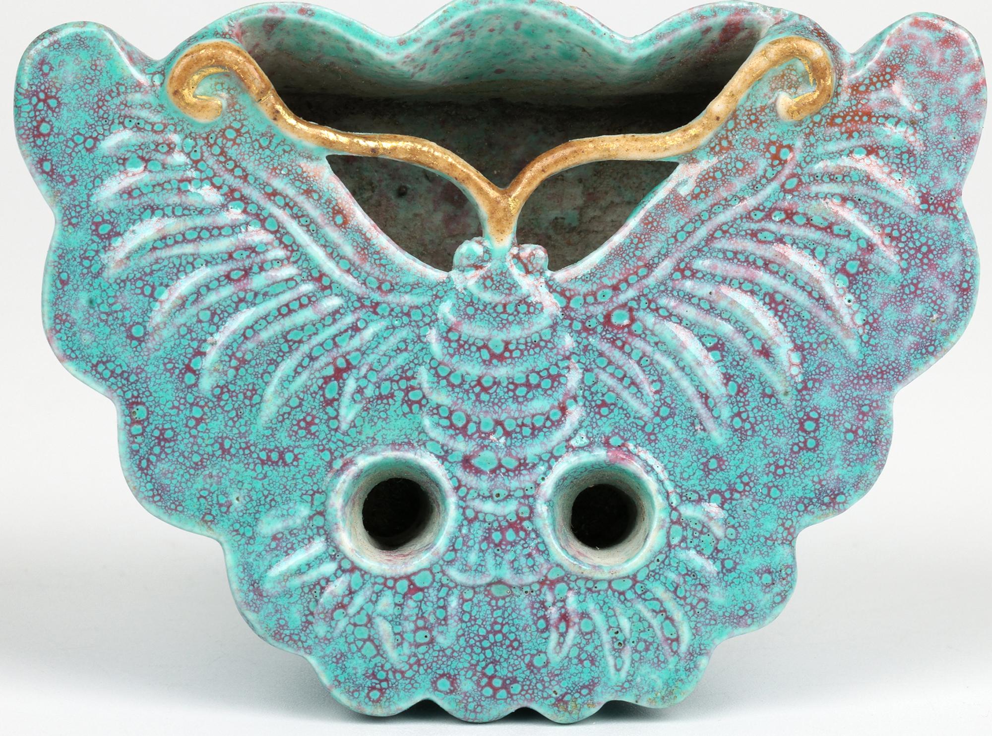 An exceptionally fine antique Chinese qing brush washer decorated in robins egg glazes and modelled as a moth dating from the 19th century. This rare and unusual porcelain brush washer is formed as a moth with the top beautifully formed as a moth