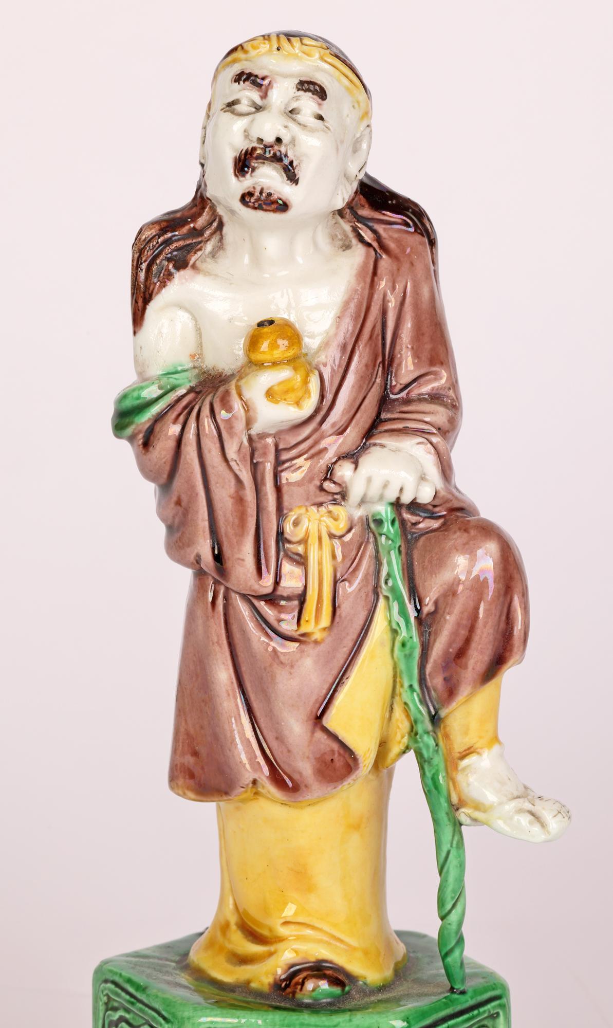 Chinese Qing Sancai Glazed Immortal Figure For Sale 4
