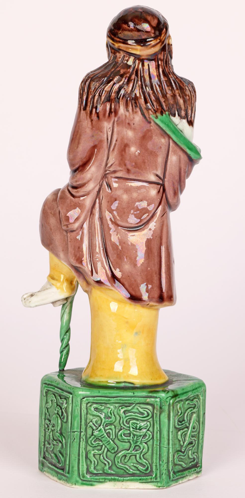 Chinese Qing Sancai Glazed Immortal Figure For Sale 9